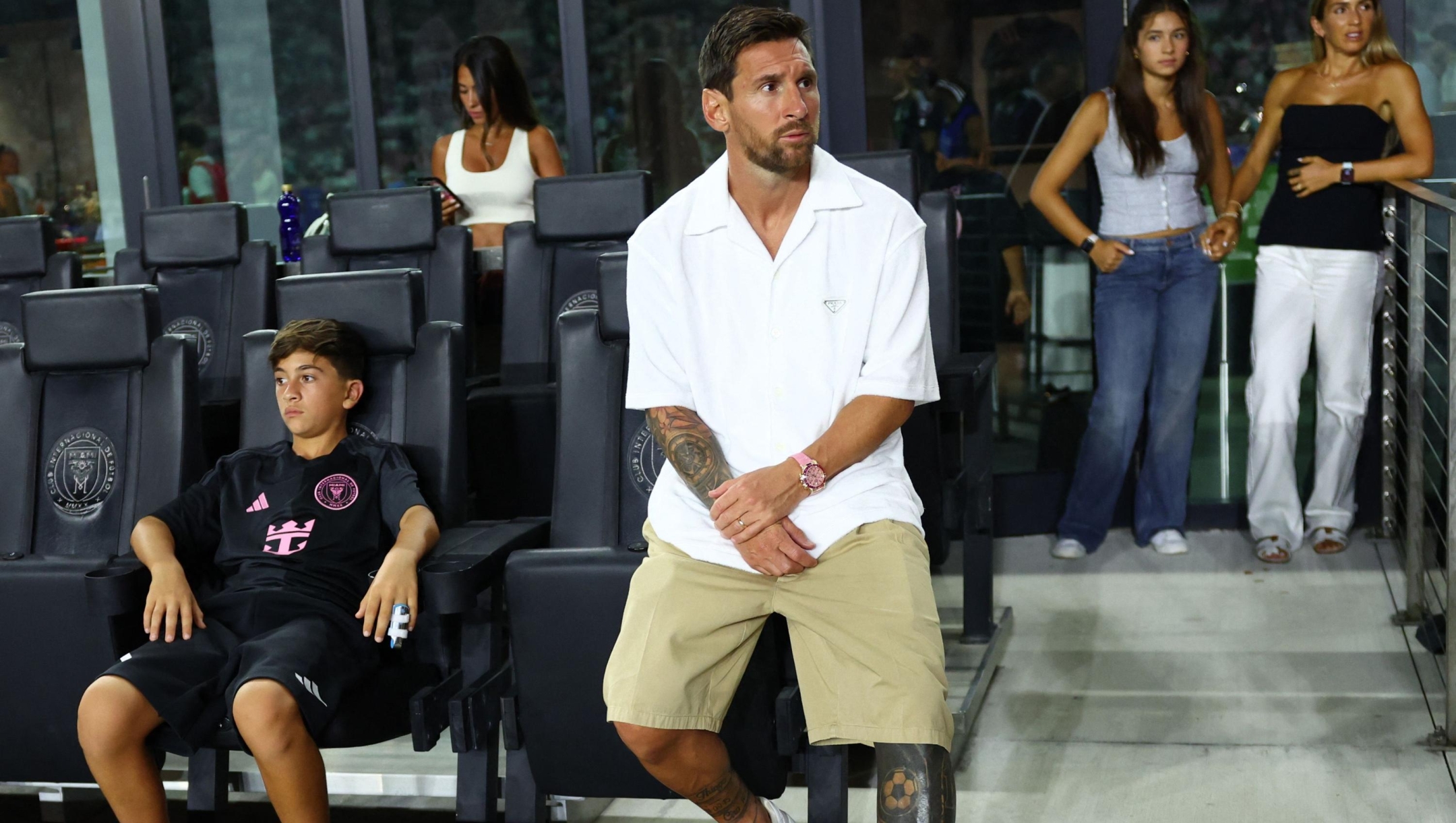 Lionel Messi #10 of Inter Miami CF looks on from the stands next to his son Thiago Messi after the MLS match between Inter Miami CF and FC Cincinnati at Chase Stadium on July 26, 2025 in Fort Lauderdale, Florida. Megan Briggs/Getty Images/AFP (Photo by Megan Briggs / GETTY IMAGES NORTH AMERICA / Getty Images via AFP)