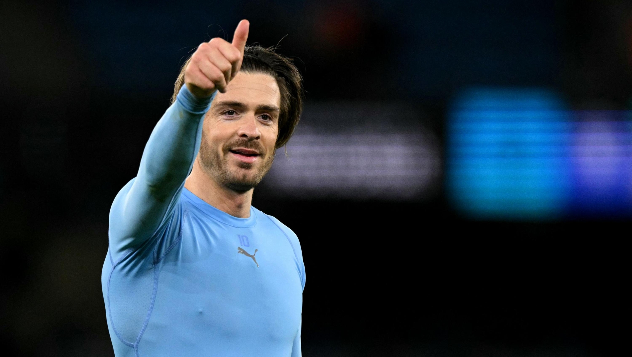 Manchester City's English midfielder #10 Jack Grealish reacts following the English FA Cup fifth round football match between Manchester City and Plymouth Argyle at the Etihad Stadium in Manchester, north west England, on March 1, 2025. (Photo by Oli SCARFF / AFP) / RESTRICTED TO EDITORIAL USE. No use with unauthorized audio, video, data, fixture lists, club/league logos or 'live' services. Online in-match use limited to 120 images. An additional 40 images may be used in extra time. No video emulation. Social media in-match use limited to 120 images. An additional 40 images may be used in extra time. No use in betting publications, games or single club/league/player publications. /