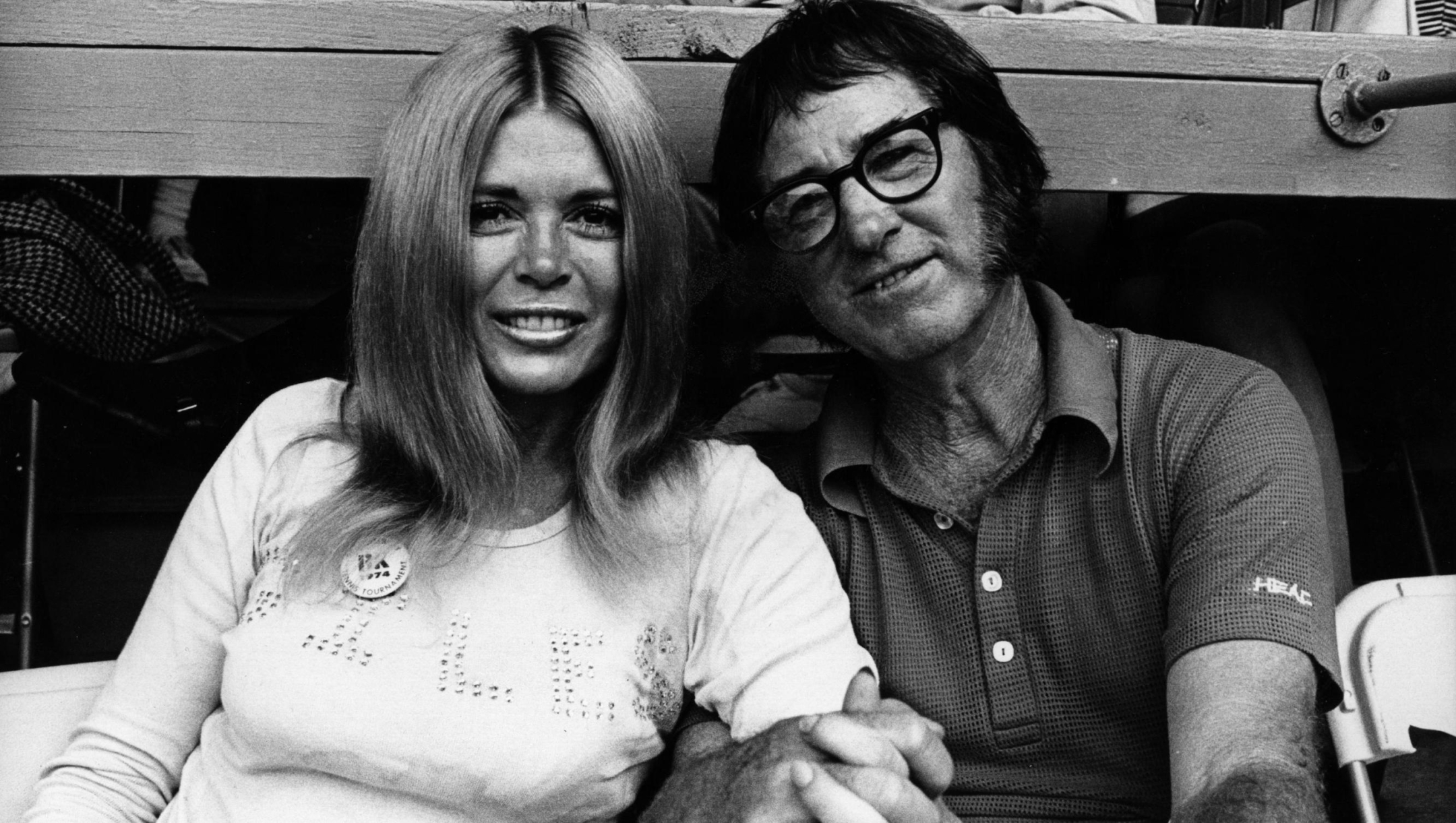 Former American tennis champion Bobby Riggs holding hands with Sandra Giles.  (Photo by Keystone/Getty Images)