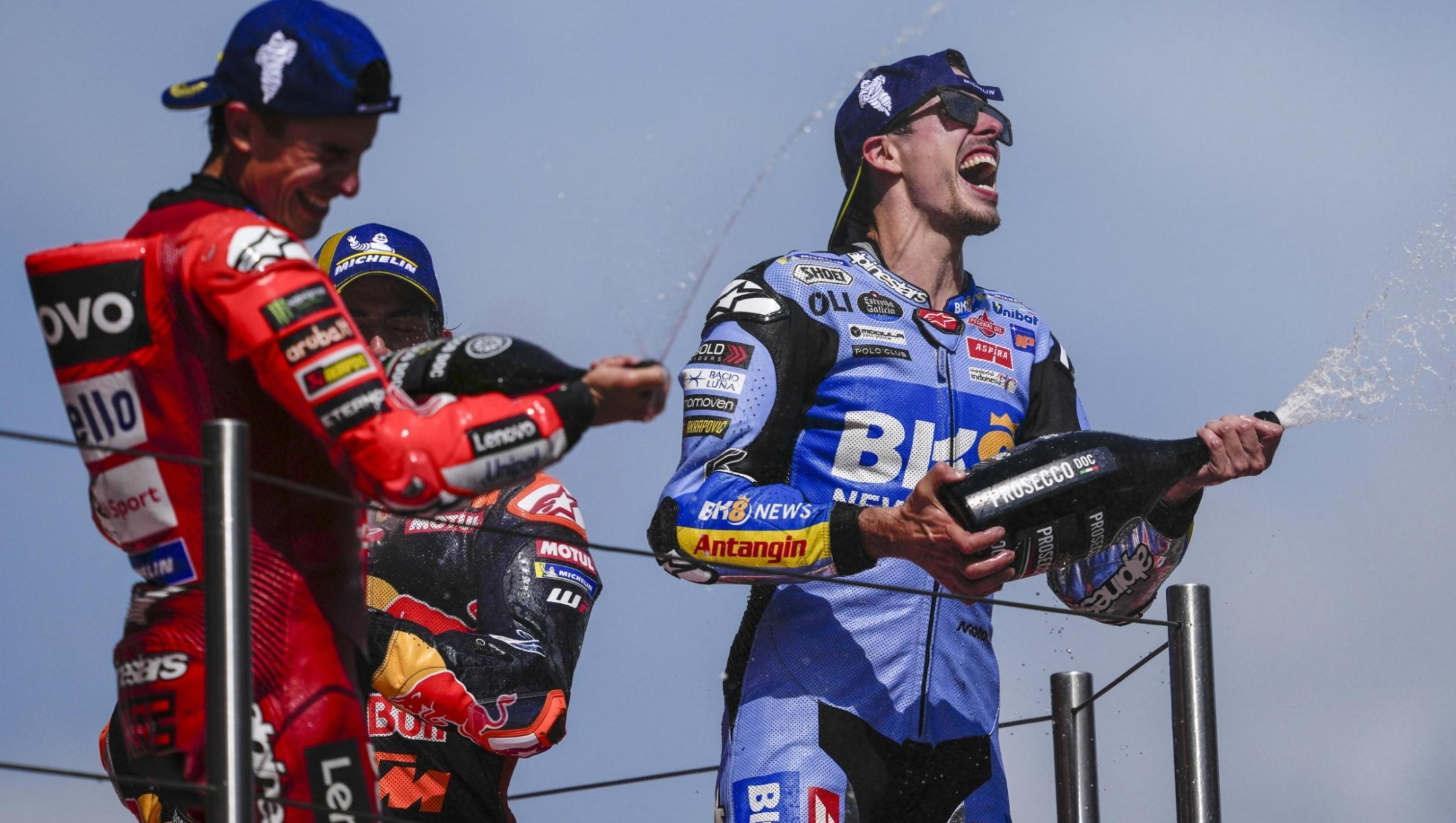 epa12359547 Spanish MotoGP riders Alex Marquez (R) and Marc Marquez (L) celebrate their first and second place on the podium following the Catalonia MotoGP Grand Prix at the Barcelona-Catalonia Circuit in Montmelo, Barcelona, Spain, 07 September 2025.  EPA/ALEJANDRO GARCIA