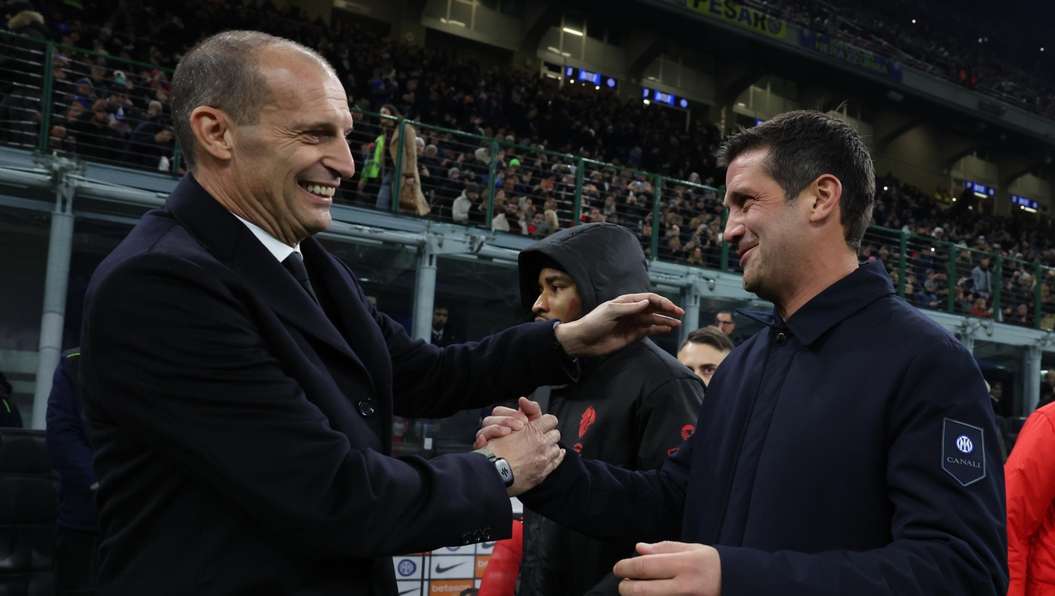   Head coach of AC Milan Massimiliano Allegri shakes hands with head coach of FC Internazionale Cristian Chivu before the Serie A match between FC Internazionale and AC Milan at Giuseppe Meazza Stadium on November 23, 2025 in Milan, Italy. (Photo by Claudio Villa/AC Milan via Getty Images)
