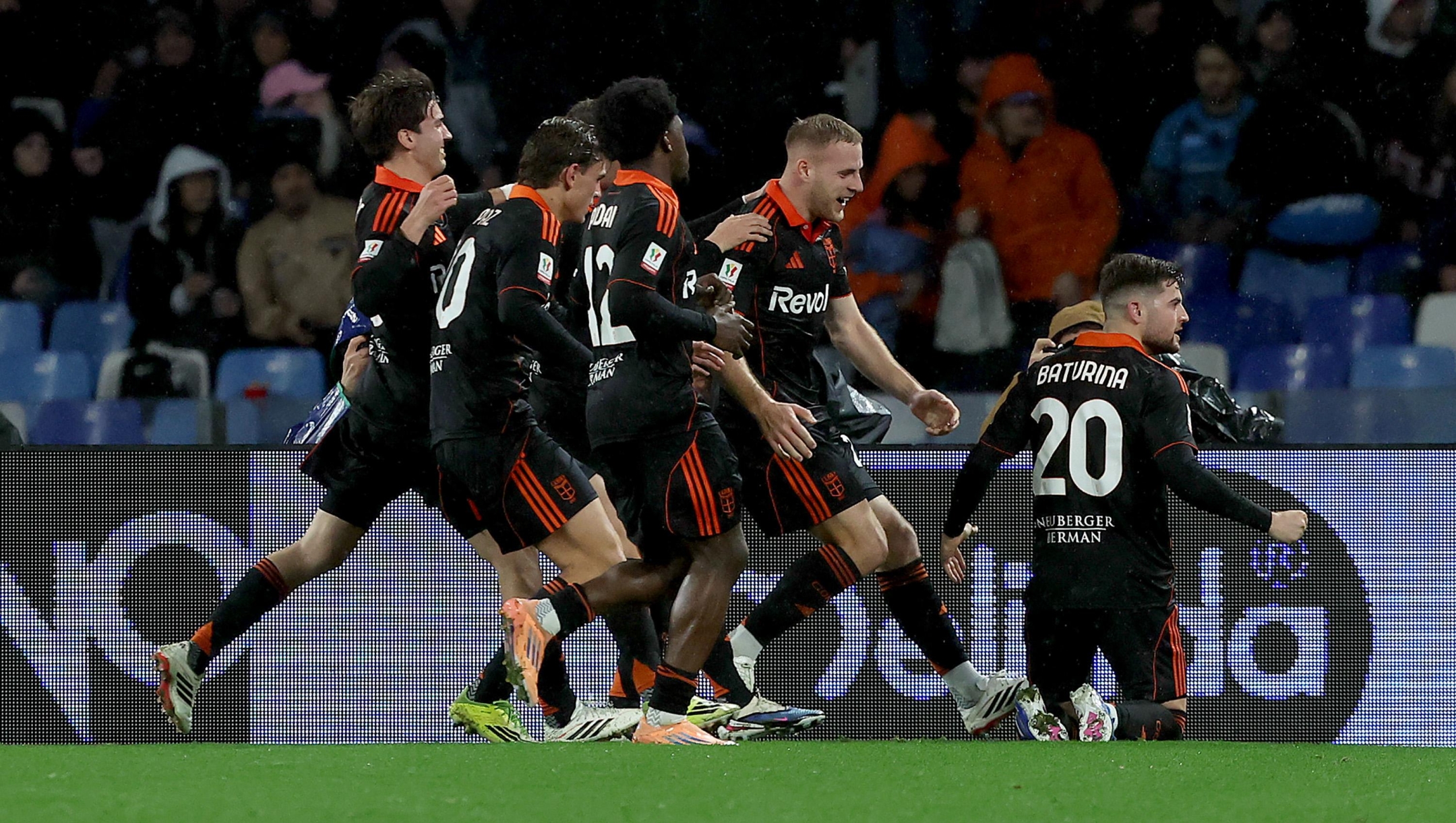  Martin Baturina of Como 1907 celebrates with teammates after scoring his team's first goal during the Coppa Italia match between SSC Napoli and Como 1907 at Stadio Diego Armando Maradona on February 10, 2026 in Naples, Italy.  (Photo by Francesco Pecoraro/Getty Images)