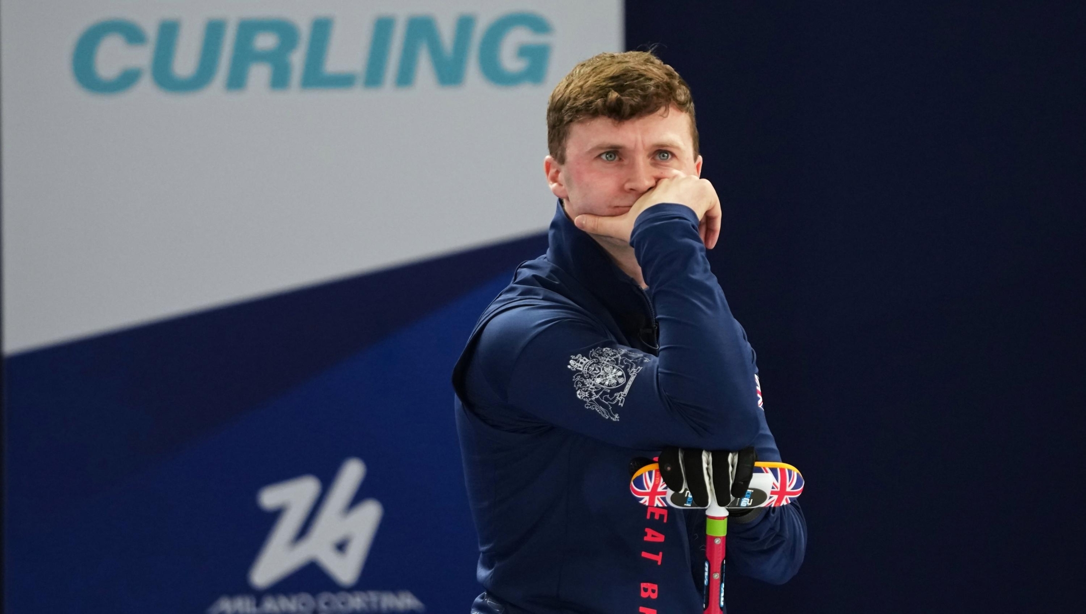Britain's Bruce Mouat reacts after the men's curling round robin session against Norway, at the 2026 Winter Olympics, in Cortina d'Ampezzo, Italy, Monday, Feb. 16, 2026. (AP Photo/Misper Apawu)