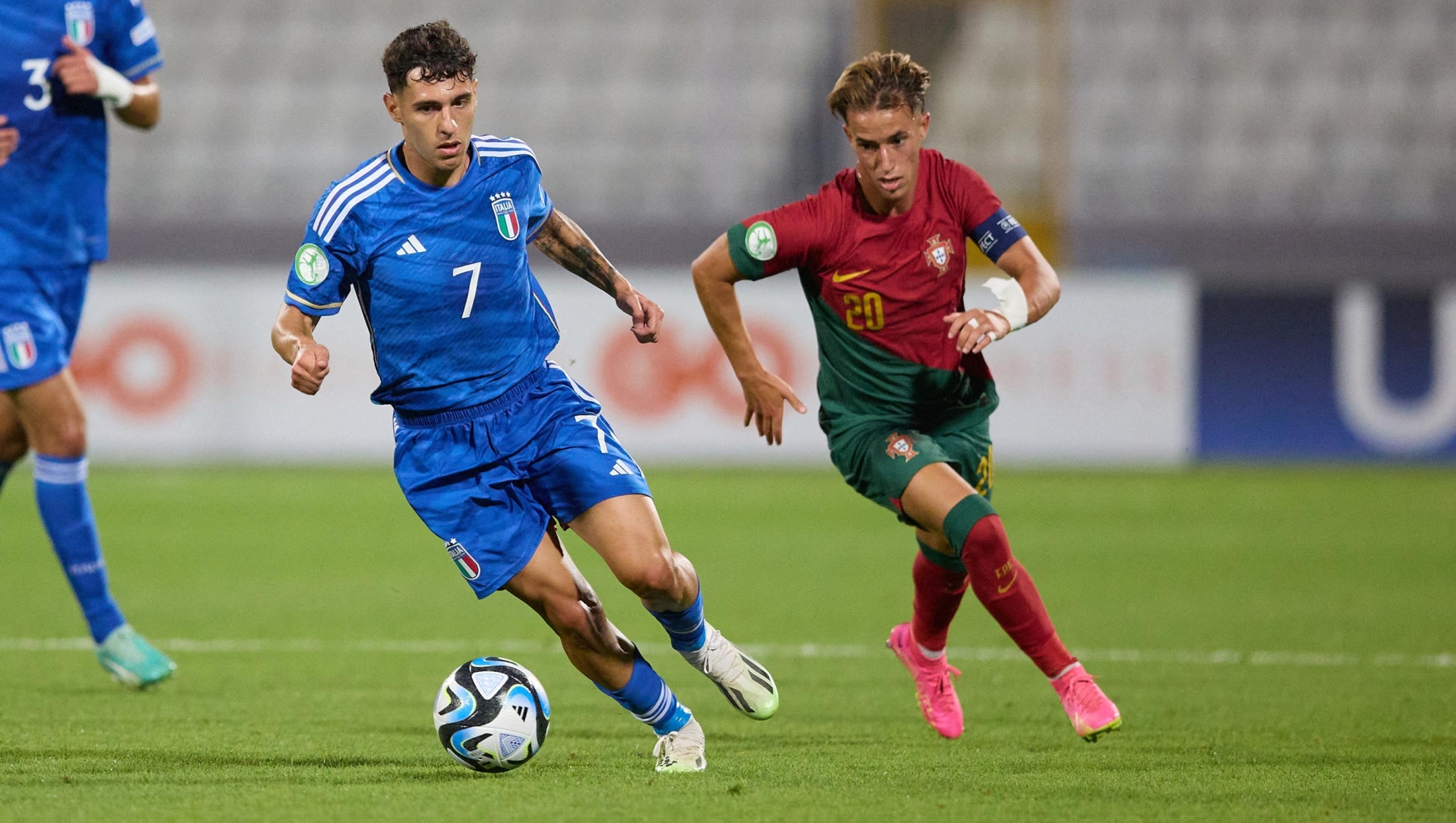  Luis Hasa (L) of Italy moves with the ball during the 2023 UEFA European Under-19 Championship final soccer match between Portugal and Italy at the National Stadium, on July 16, 2023, in Ta' Qali, Malta.  (Photo by Domenic Aquilina/NurPhoto) (Photo by Domenic Aquilina / NurPhoto via AFP)