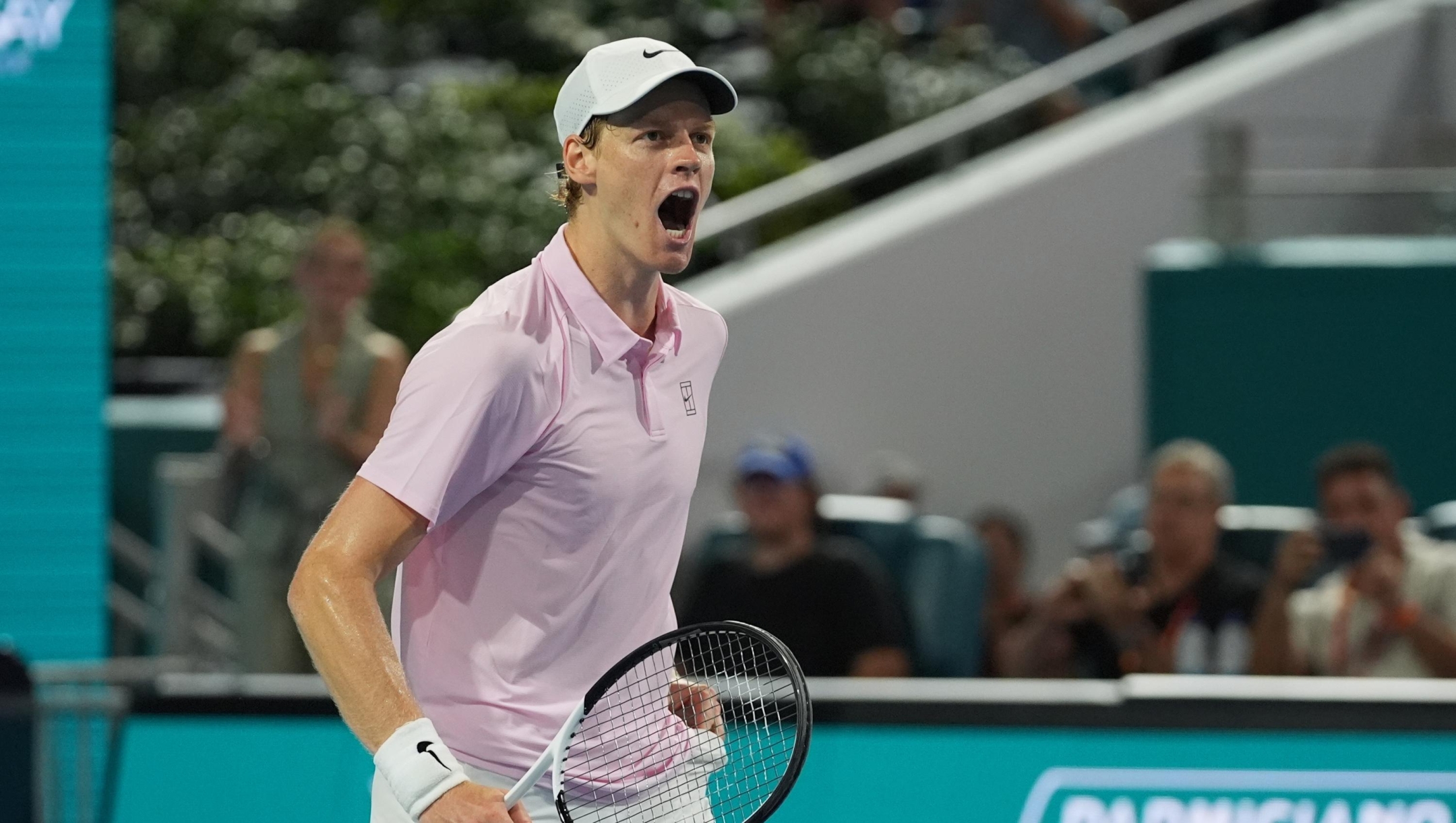 Jannik Sinner of Italy reacts after defeating Alexander Zverev of Germany during a semifinal match at the Miami Open tennis tournament, Friday, March 27, 2026, in Miami Gardens, Fla. (AP Photo/Marta Lavandier)