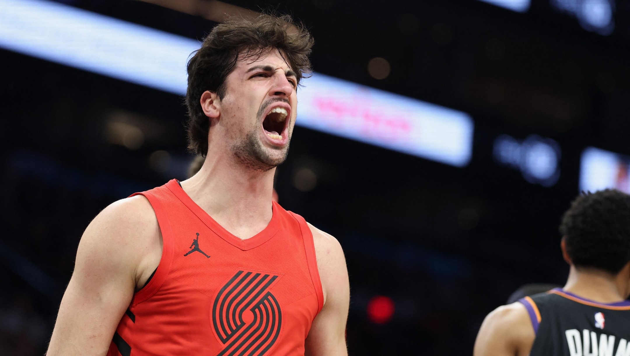  Deni Avdija #8 of the Portland Trail Blazers reacts after scoring and drawing a foul against the Phoenix Suns during the first half of an NBA play-in tournament game at Mortgage Matchup Center on April 14, 2026 in Phoenix, Arizona. NOTE TO USER: User expressly acknowledges and agrees that, by downloading and or using this photograph, user is consenting to the terms and conditions of the Getty Images License Agreement.   Christian Petersen/Getty Images/AFP (Photo by Christian Petersen / GETTY IMAGES NORTH AMERICA / Getty Images via AFP)