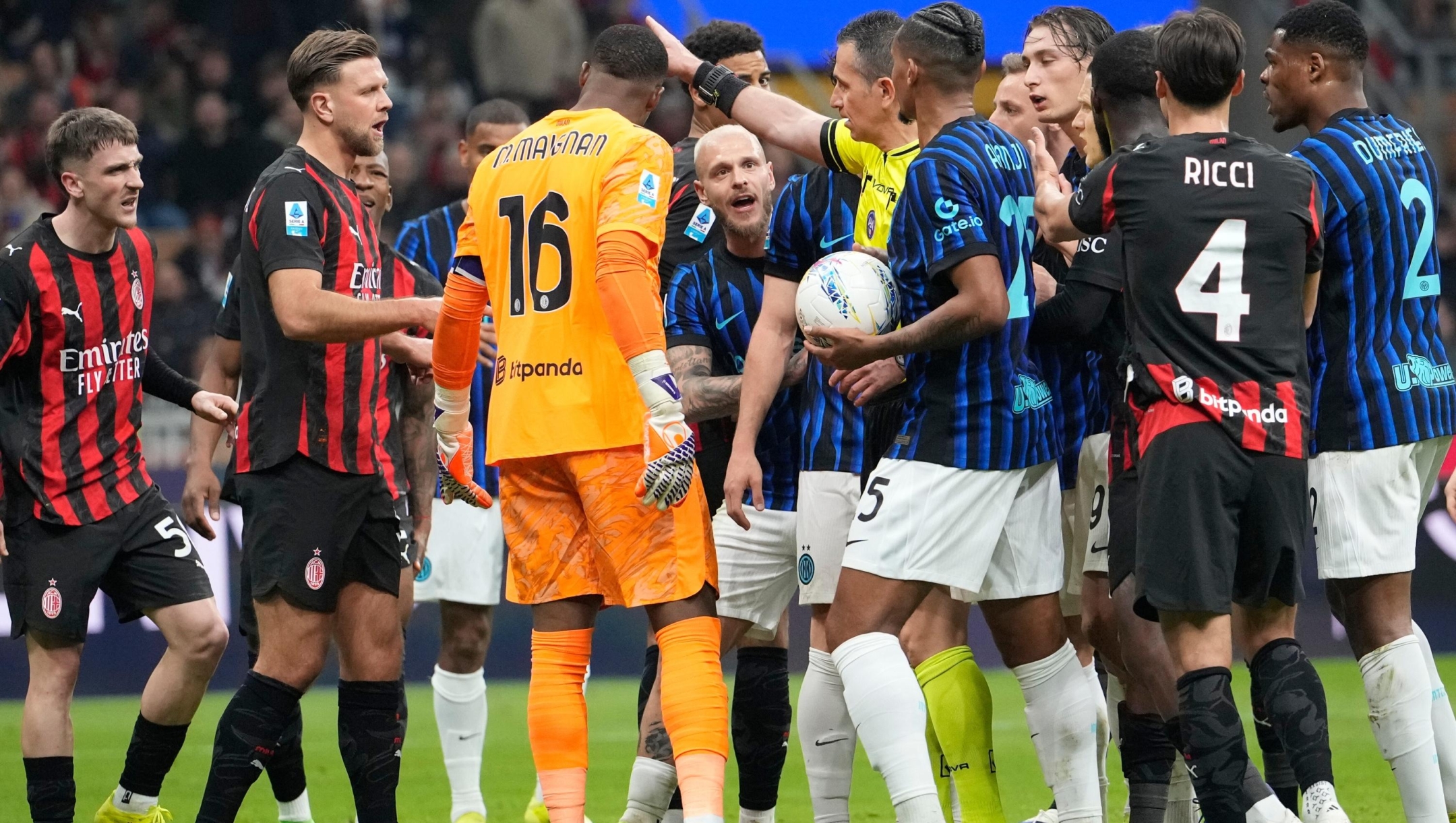 Players argue during the Serie A soccer match between AC Milan and Inter Milan, in Milan, Italy, Sunday, March 8, 2026. (AP Photo/Luca Bruno)