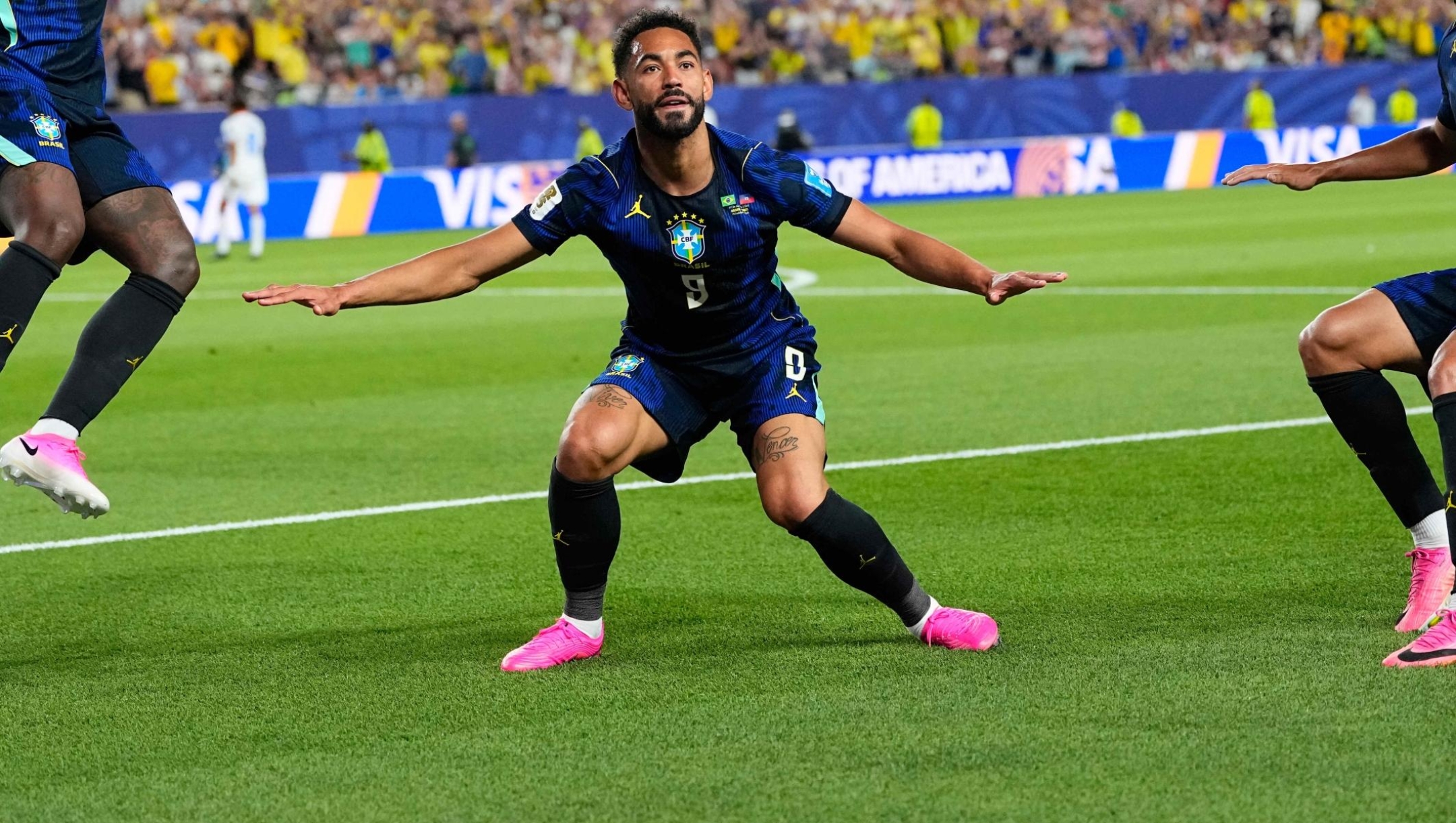 Brazil's Matheus Cunha (9) celebrates after scoring his side's second goal with Brazil's Vinicius Junior (7) and Lucas Paqueta (20) during the World Cup Group C soccer match between Brazil and Haiti in Philadelphia, Friday, June 19, 2026. (AP Photo/Petr David Josek)