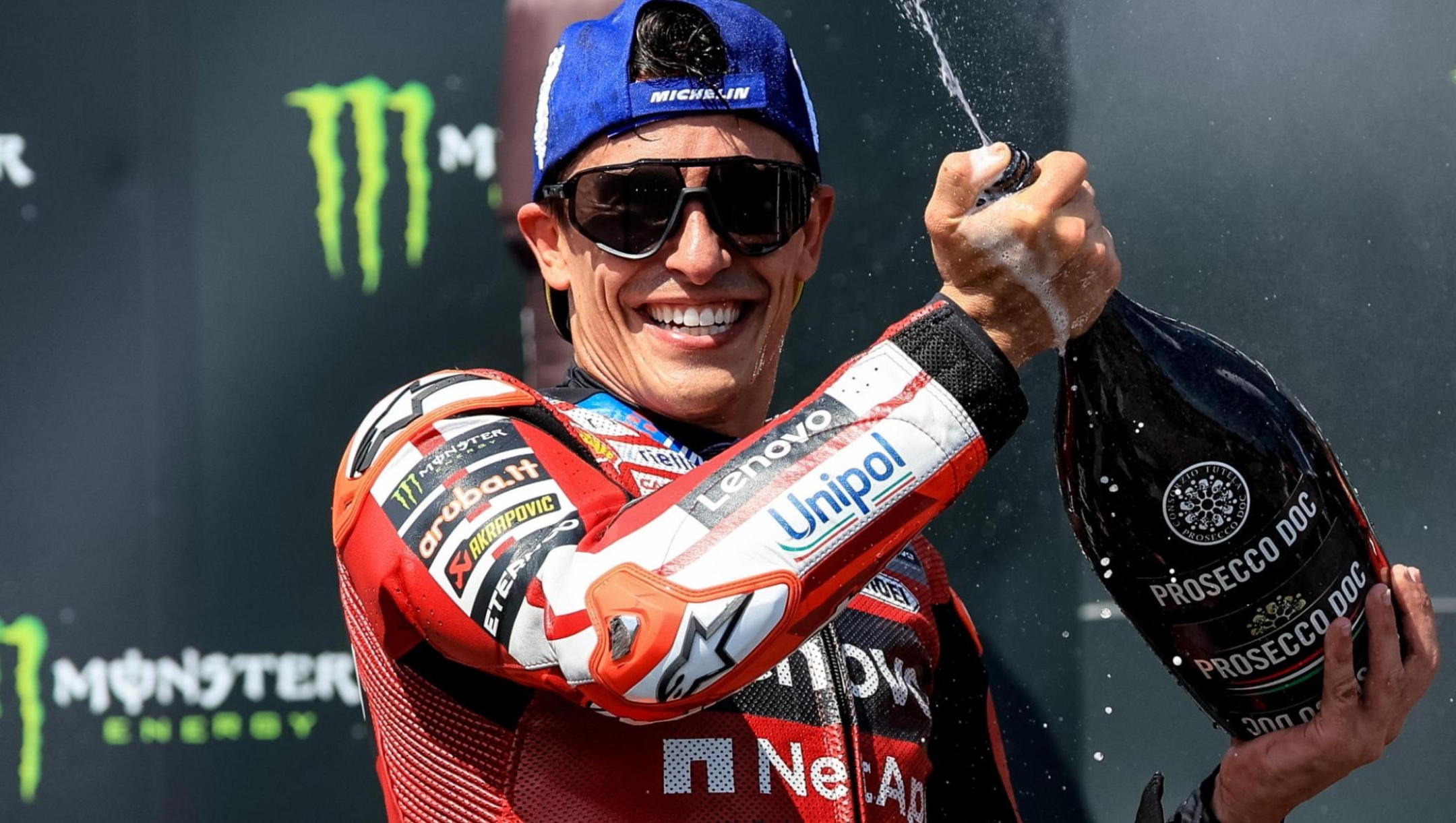 epa13054011 Spanish MotoGP rider Marc Marquez of Ducati Lenovo Team celebrates on podium after winning the the Motorcycling Grand Prix of the Czech Republic at the Masaryk Circuit in Brno, Czech Republic, 21 June 2026.  EPA/MARTIN DIVISEK