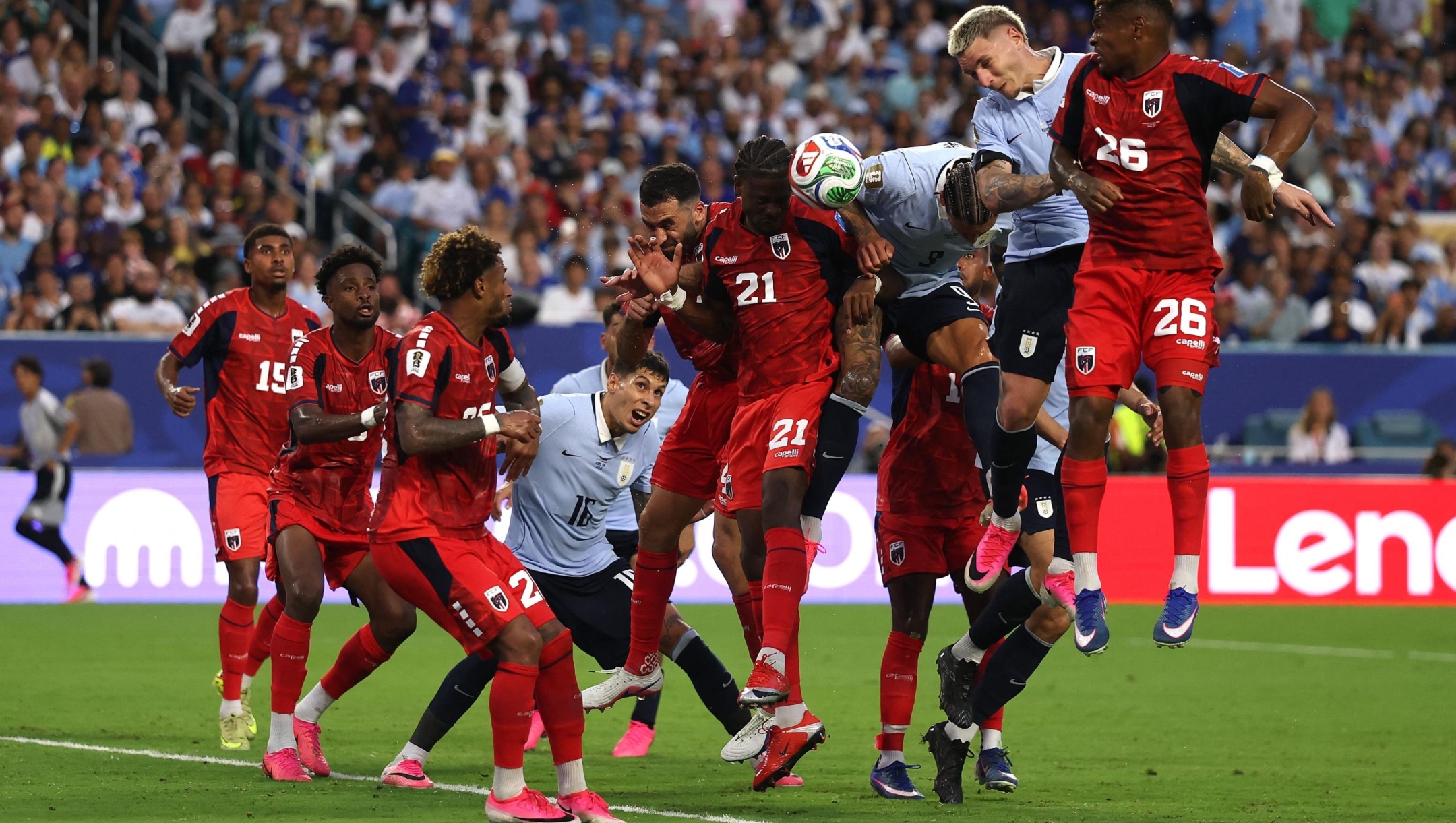  Nuno da Costa #21 of Cabo Verde competes for a header against Darwin Nunez #9 of Uruguay during the FIFA World Cup 2026 Group H match between Uruguay and Cabo Verde at Miami Stadium on June 21, 2026 in Miami Gardens, Florida.   Lars Baron/Getty Images/AFP (Photo by Lars Baron / GETTY IMAGES NORTH AMERICA / Getty Images via AFP)