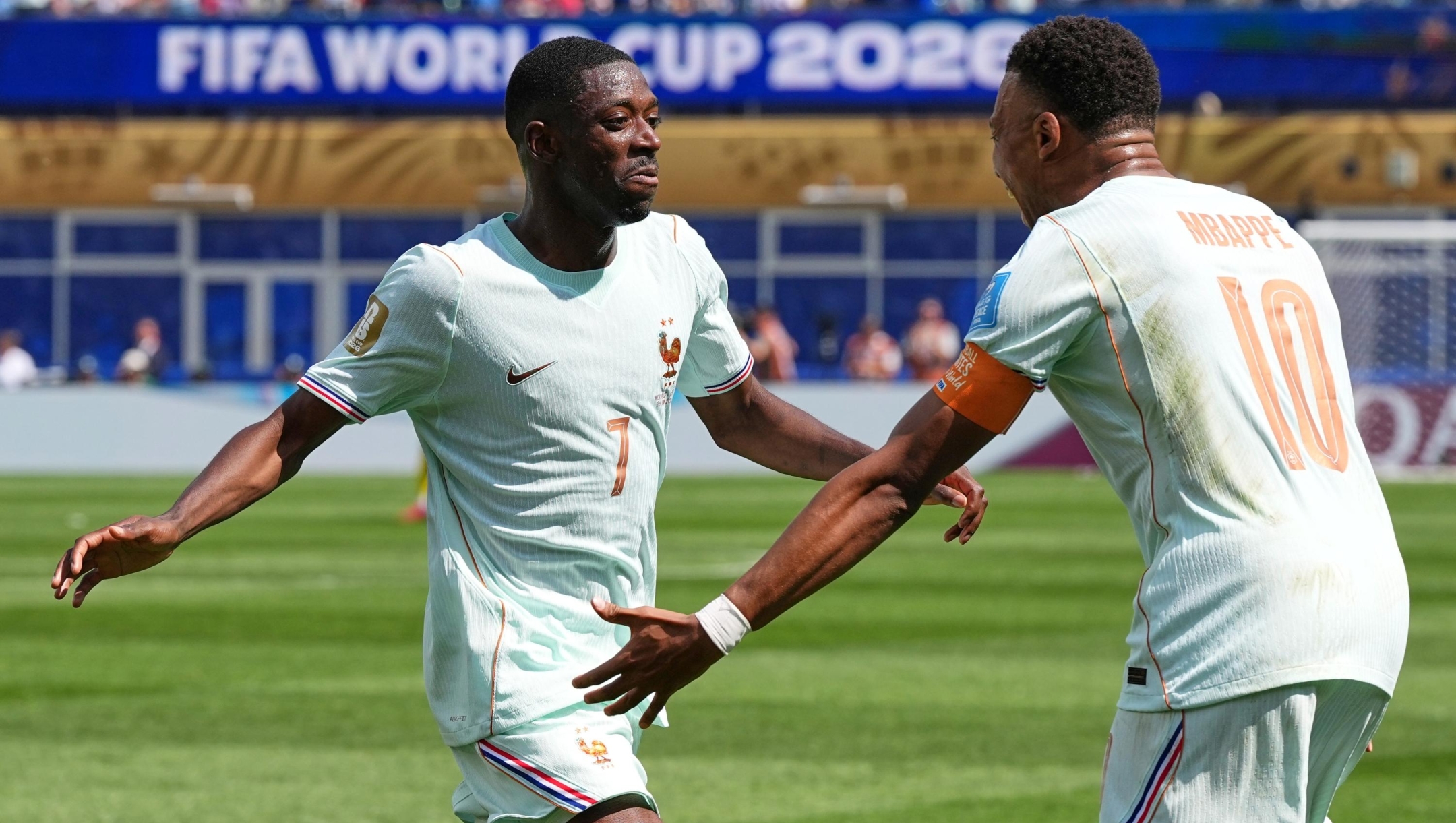 France's Ousmane Dembele celebrates with Kylian Mbappe, right, after scoring his side's third goal during the World Cup Group I soccer match between Norway and France in Foxborough, Mass., near Boston, Friday, June 26, 2026. (AP Photo/Martin Meissner)