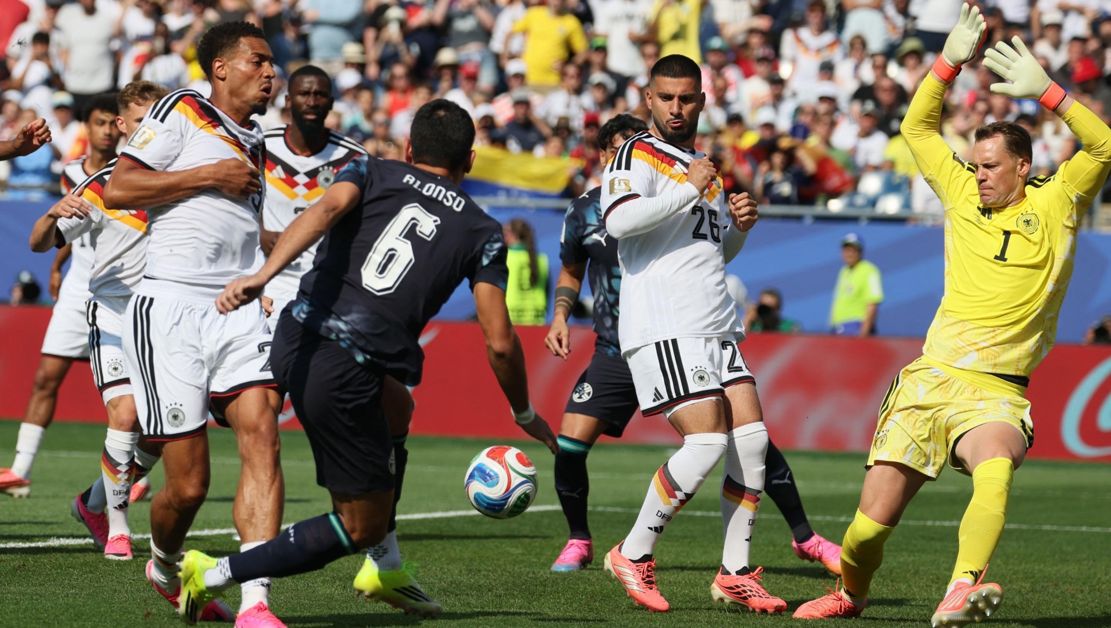 Paraguay's defender #06 Junior Alonso kicks the ball and misses a chance past Germany's goalkeeper #01 Manuel Neuer during the 2026 World Cup round of 32 football match between Germany and Paraguay at the Boston Stadium in Foxborough on June 29, 2026.  (Photo by Odd ANDERSEN / AFP)