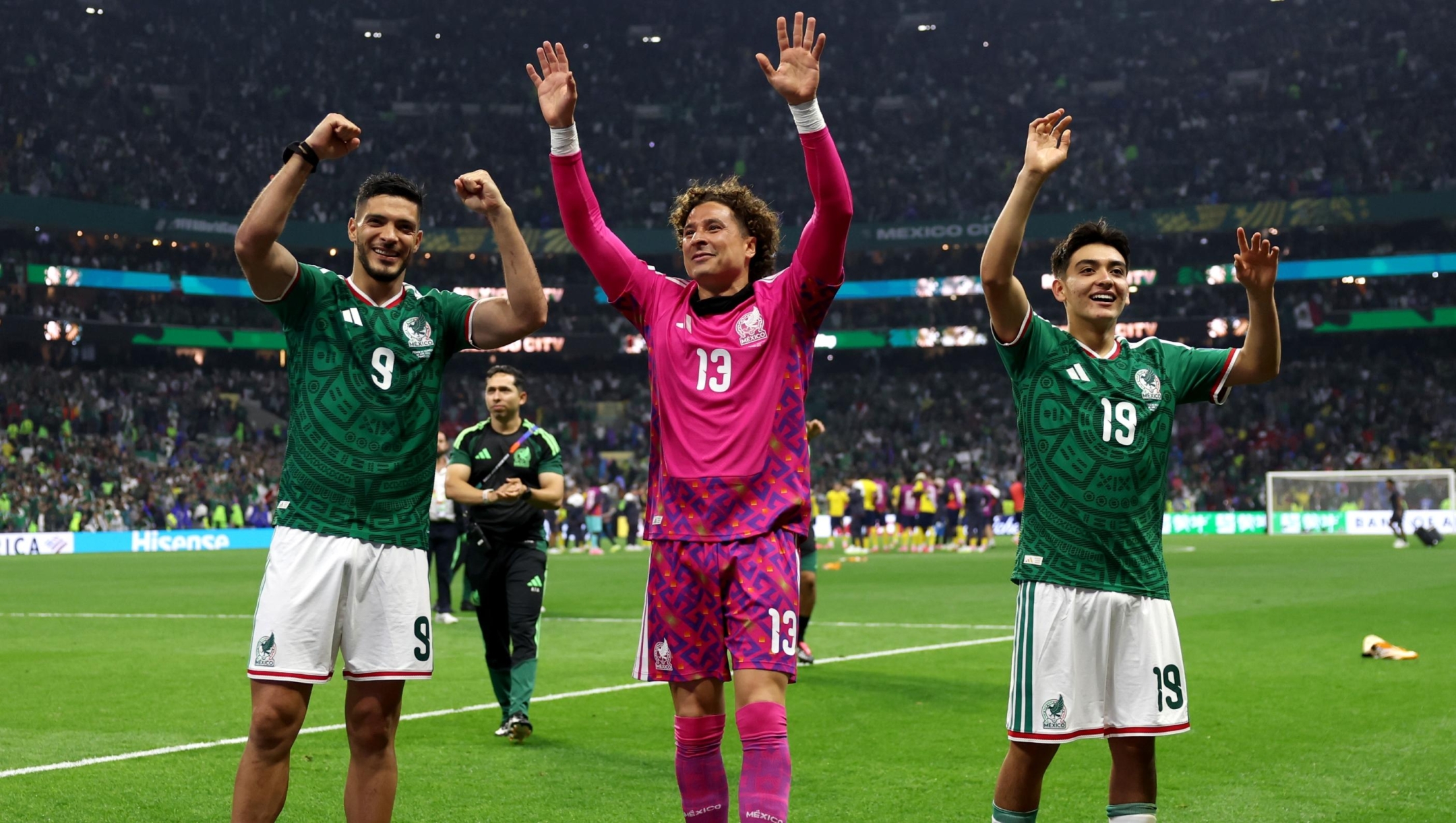  Raul Jimenez #9, Guillermo Ochoa #13 and Gilberto Mora #19 of Mexico celebrate after the team's victory and progression to the Round of 16 after the FIFA World Cup 2026 Round Of 32 match between Mexico and Ecuador at Mexico City Stadium on June 30, 2026 in Mexico City, Mexico. (Photo by Luke Hales/Getty Images)