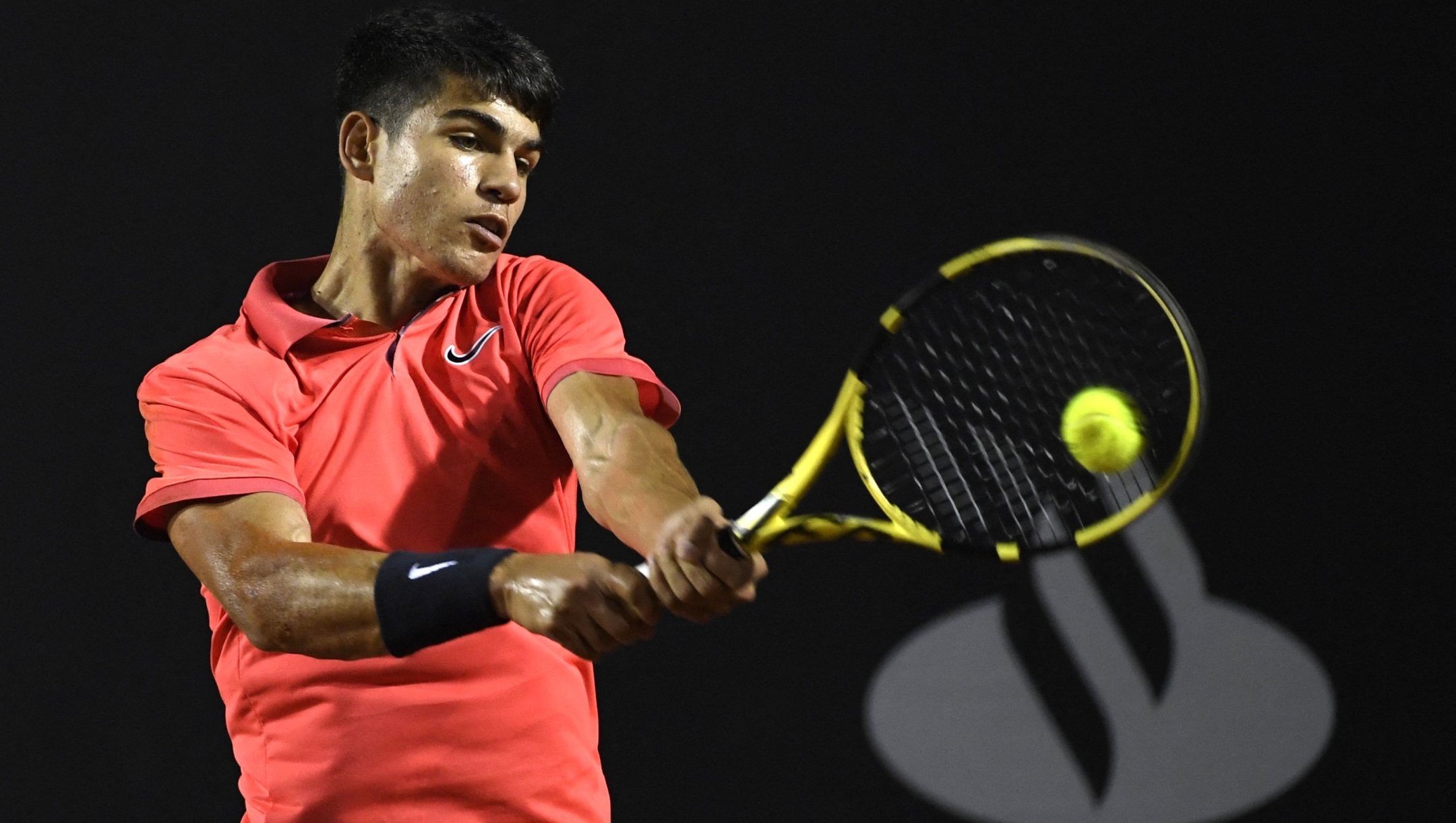 (FILES) Spain's Carlos Alcaraz hits the ball during the match against Argentina's Federico Coria during the ATP World Tour Rio Open 2020 tournament, Jockey Club in Rio de Janeiro, Brazil on February 19, 2020. (Photo by MAURO PIMENTEL / AFP)