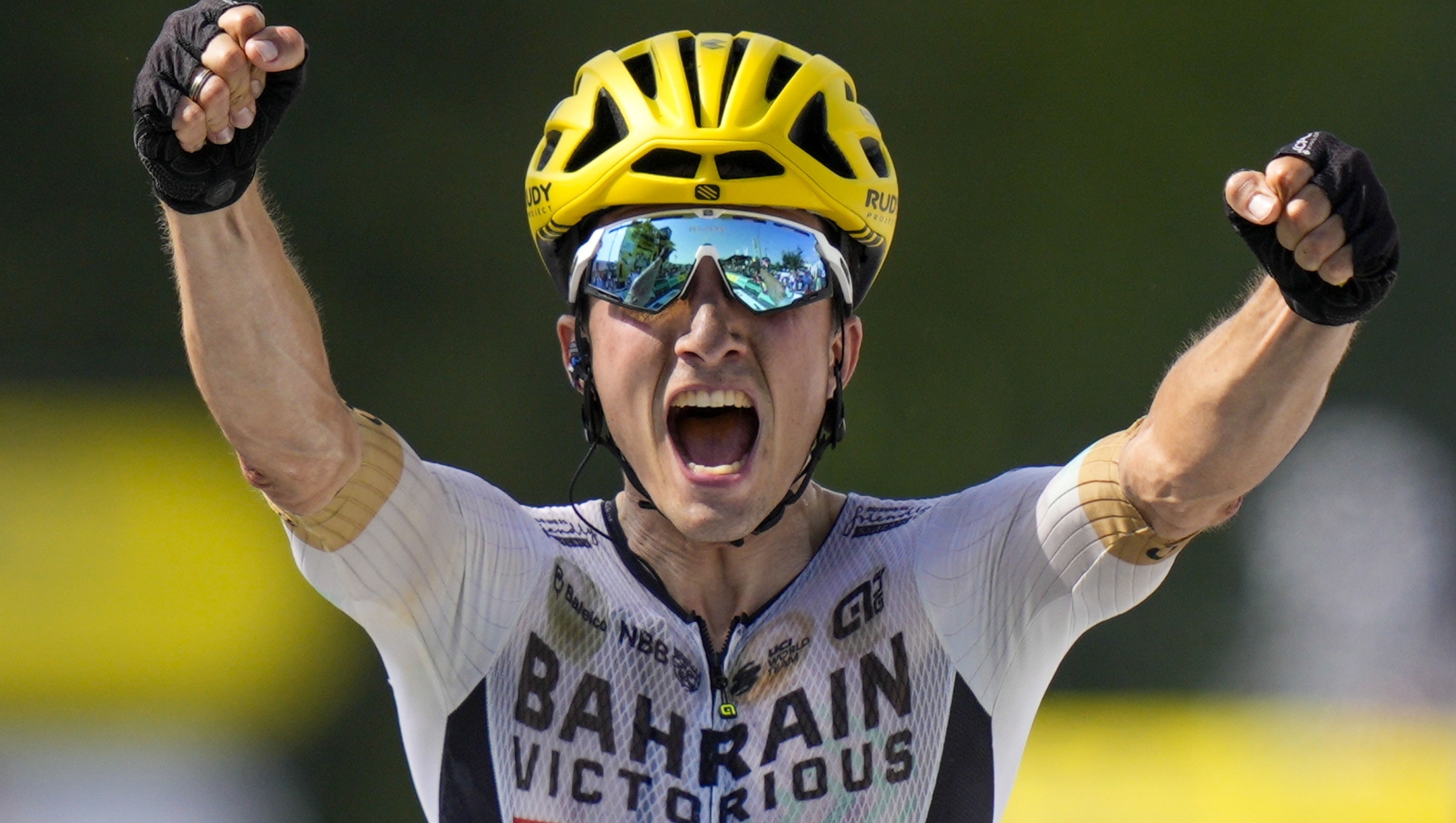 Spain's Pelle Bilbao crosses the finish line to win the tenth stage of the Tour de France cycling race over 167 kilometers (104 miles) with start in Vulcania and finish in Issoire, France, Tuesday, July 11, 2023. (AP Photo/Daniel Cole)