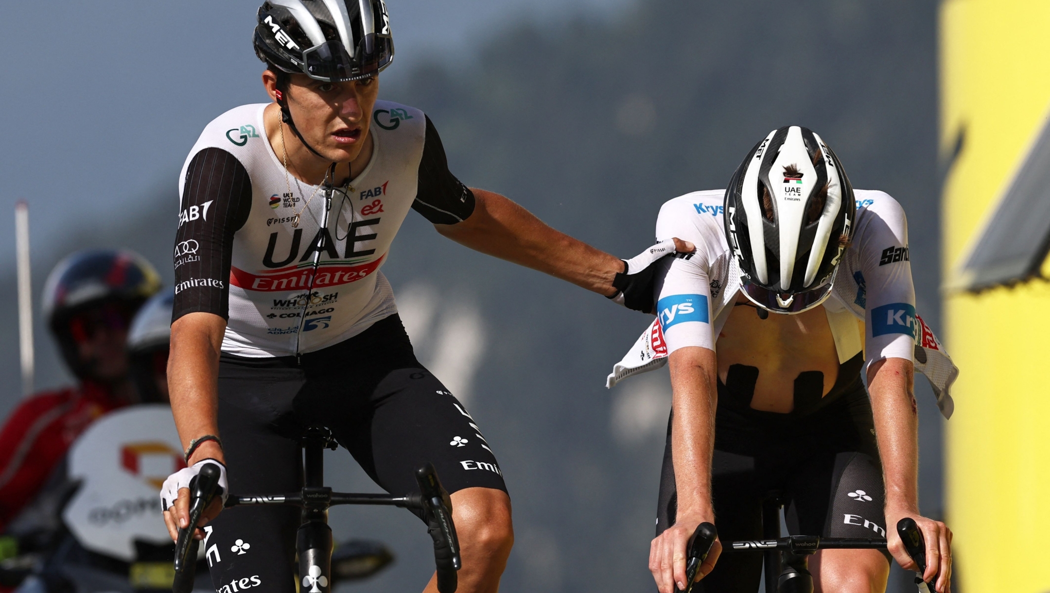 UAE Team Emirates' Spanish rider Marc Soler (L) and UAE Team Emirates' Slovenian rider Tadej Pogacar cycle to the finish line of the 17th stage of the 110th edition of the Tour de France cycling race, 166 km between Saint-Gervais Mont-Blanc and Courchevel, in the French Alps, on July 19, 2023. (Photo by Anne-Christine POUJOULAT / AFP)