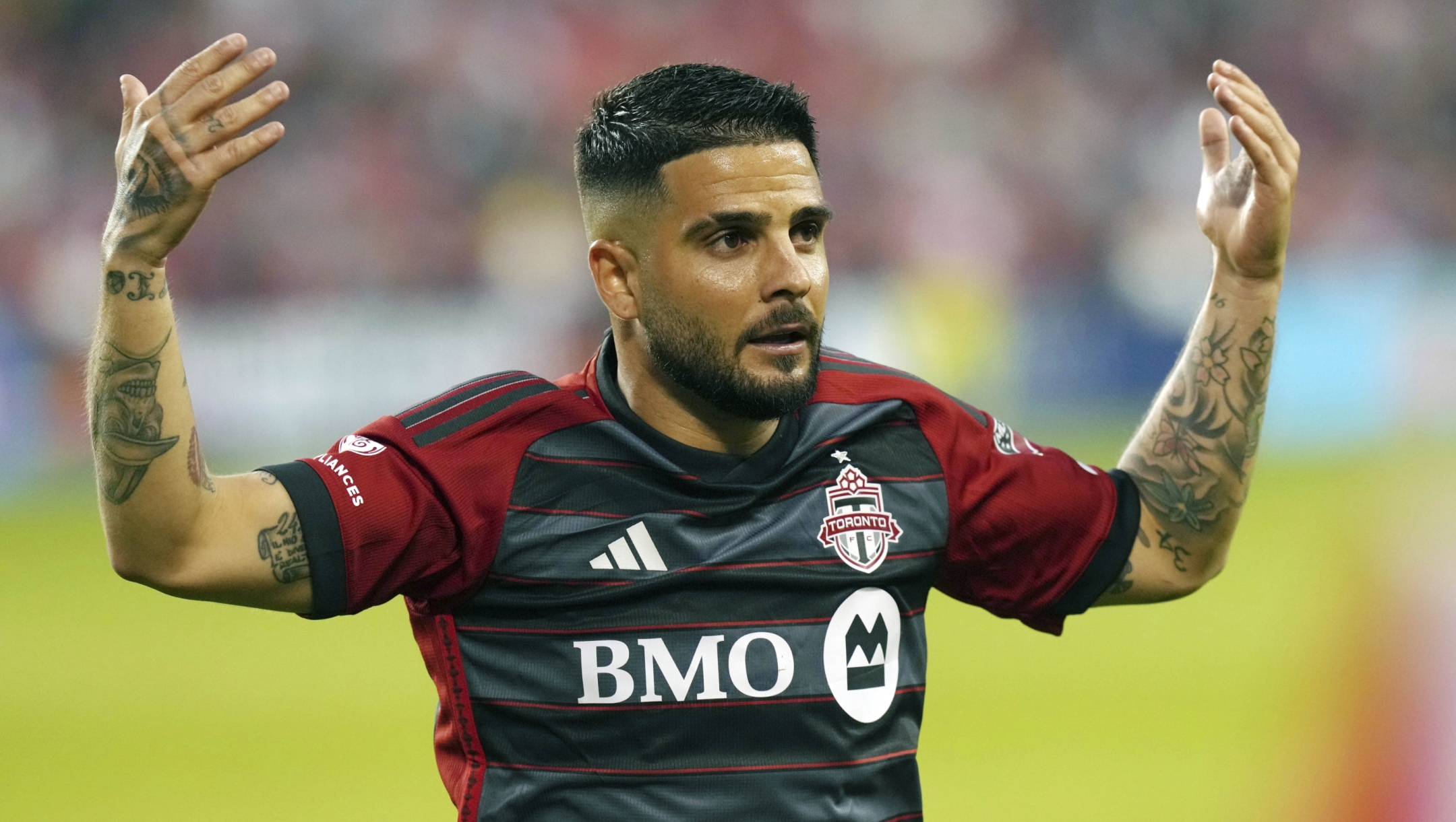 Toronto FC's Lorenzo Insigne tries to fire up the home crowd during his team's 1-1 tie with Nashville SC in an MLS soccer game in Toronto, on Saturday, June 10, 2023. (Chris Young/The Canadian Press via AP)