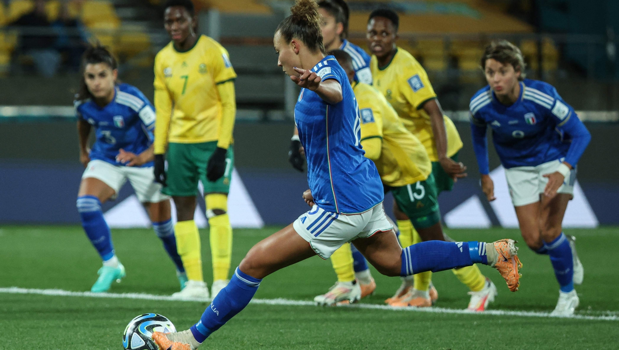 Italy's midfielder #18 Arianna Caruso scores her team's first goal from the penalty kick during the Australia and New Zealand 2023 Women's World Cup Group G football match between South Africa and Italy at Wellington Stadium in Wellington on August 2, 2023. (Photo by Marty MELVILLE / AFP)