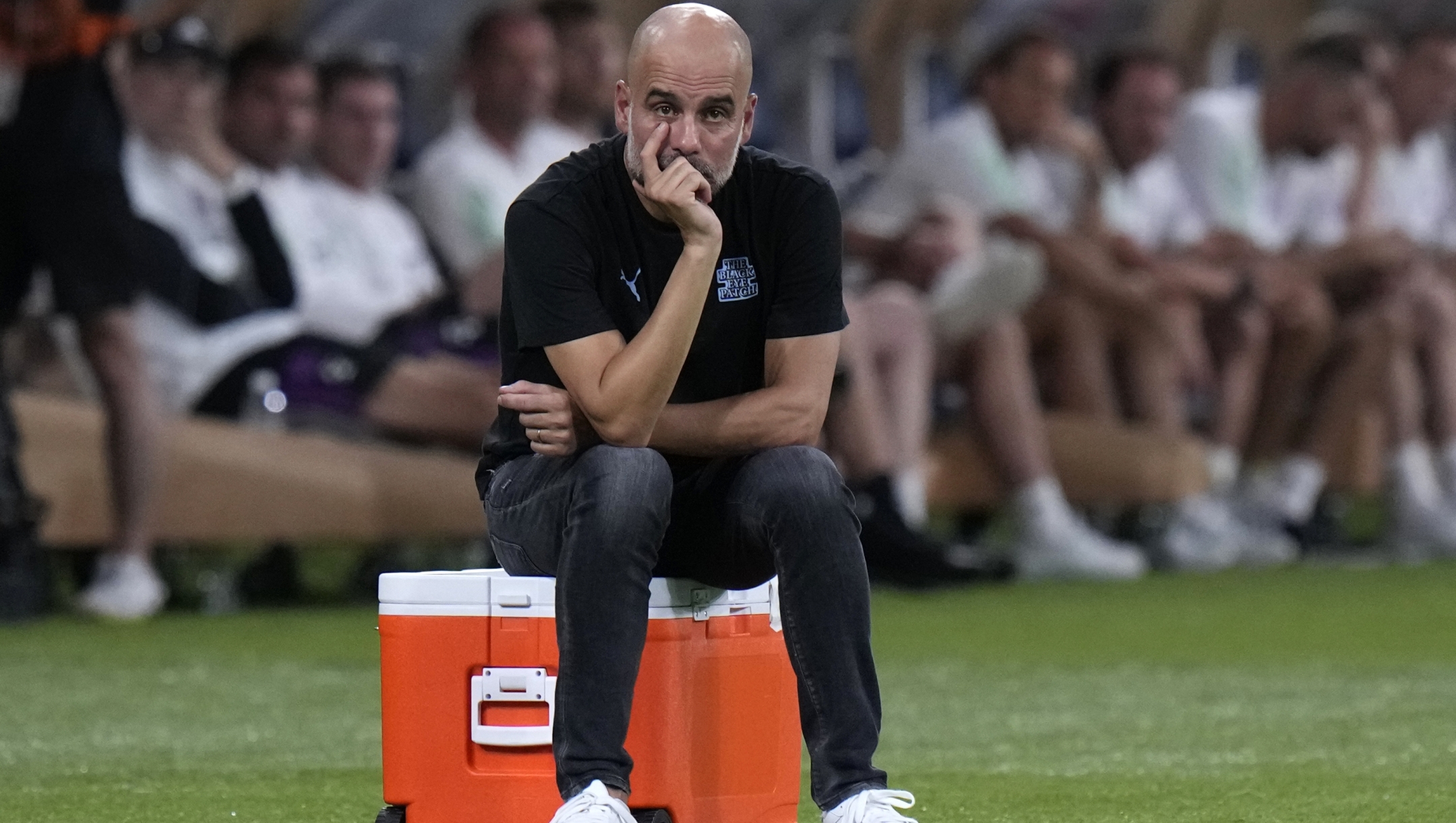 Manchester City manager Pep Guardiola looks on during a friendly soccer match against Bayern at the National Stadium in Tokyo, Japan, Wednesday, July 26, 2023.(AP Photo/Shuji Kajiyama)