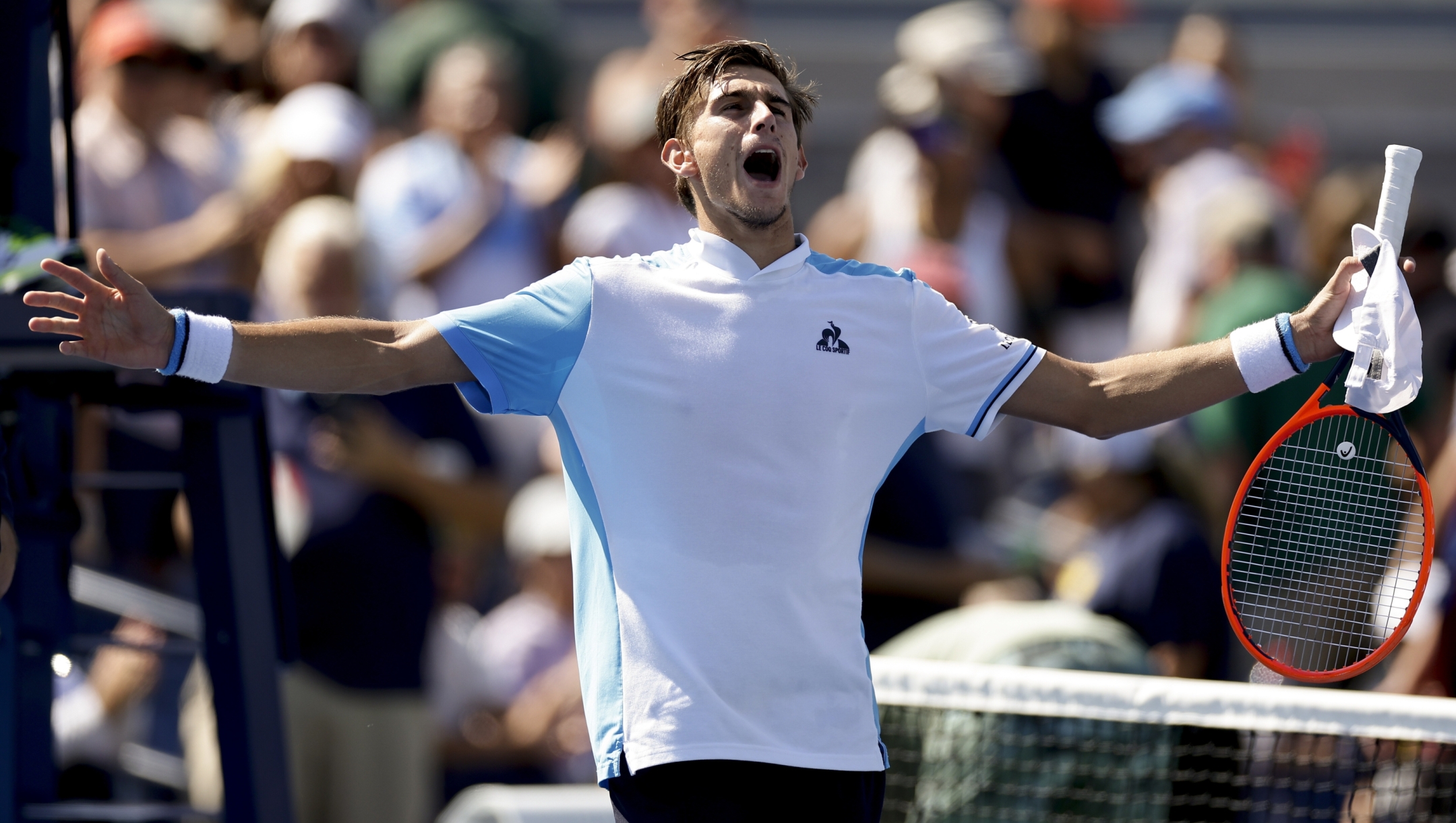 Matteo Arnaldi, of Italy, reacts after defeating Cameron Norrie, of Great Britain, during the third round of the U.S. Open tennis championships, Saturday, Sept. 2, 2023, in New York. (AP Photo/Adam Hunger)