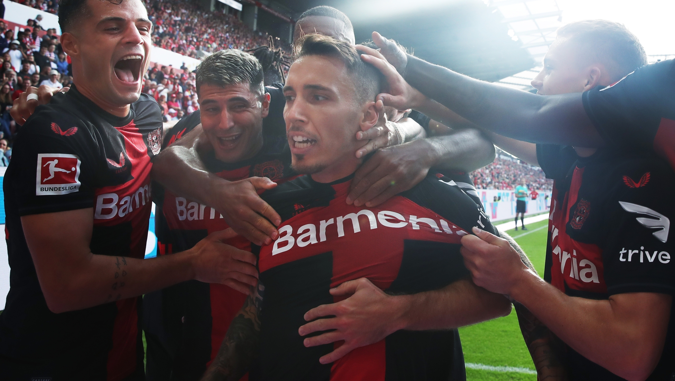 MAINZ, GERMANY - SEPTEMBER 30: Alex Grimaldo of Bayer Leverkusen celebrates the team's second goal with teammates during the Bundesliga match between 1. FSV Mainz 05 and Bayer 04 Leverkusen at MEWA Arena on September 30, 2023 in Mainz, Germany. (Photo by Alex Grimm/Getty Images)