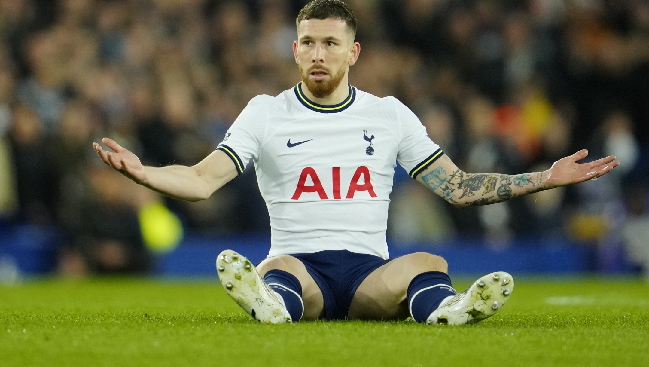 Tottenham's Pierre-Emile Hojbjerg reacts during the English Premier League soccer match between Everton and Tottenham Hotspur at the Goodison Park stadium in Liverpool, England, Monday, April 3, 2023. (AP Photo/Jon Super)