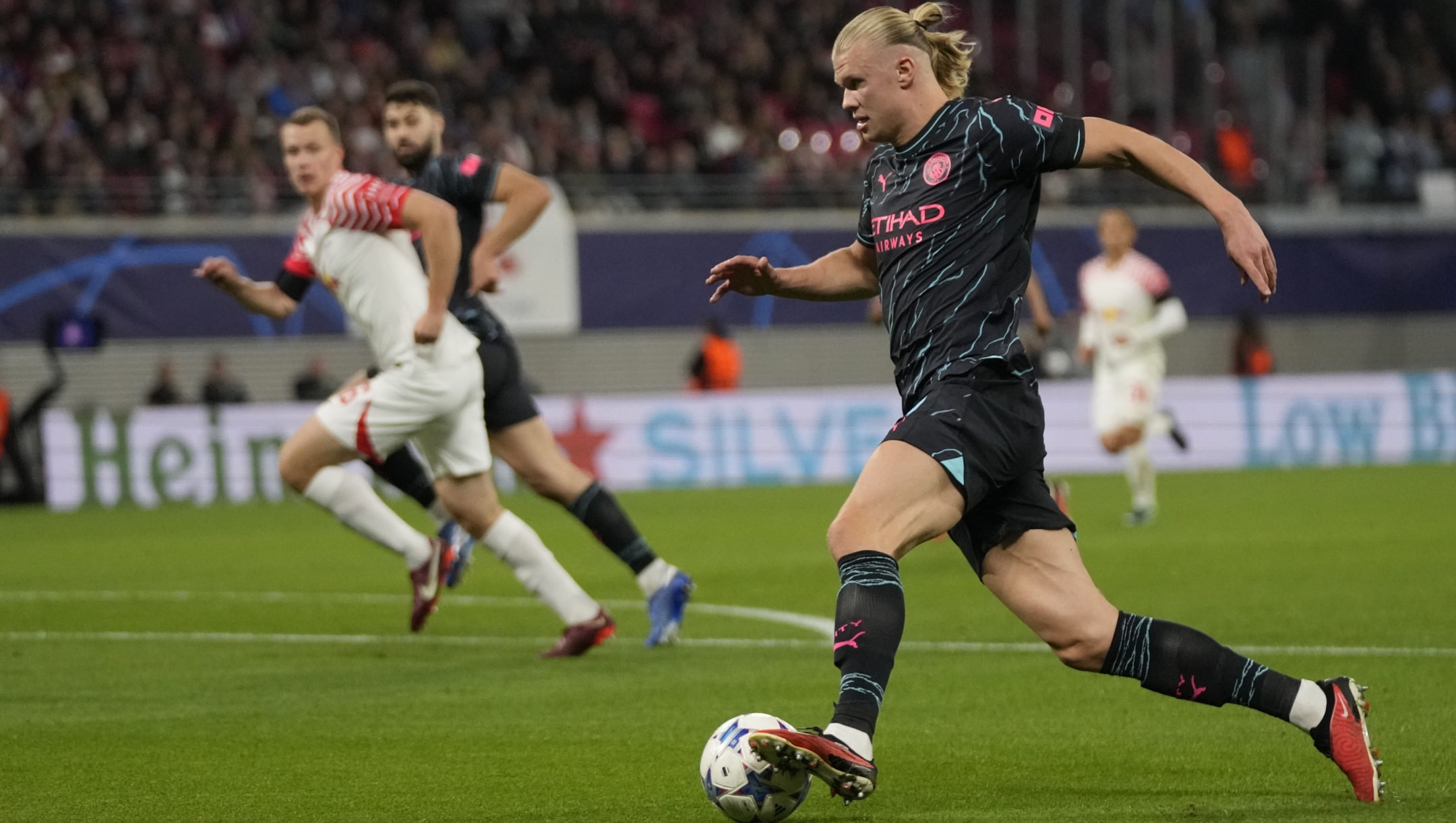 Manchester City's Erling Haaland controls the ball during the Champions League group G soccer match between RB Leipzig and Manchester City in Leipzig, Germany, Wednesday, Oct. 4, 2023. (AP Photo/Matthias Schrader)