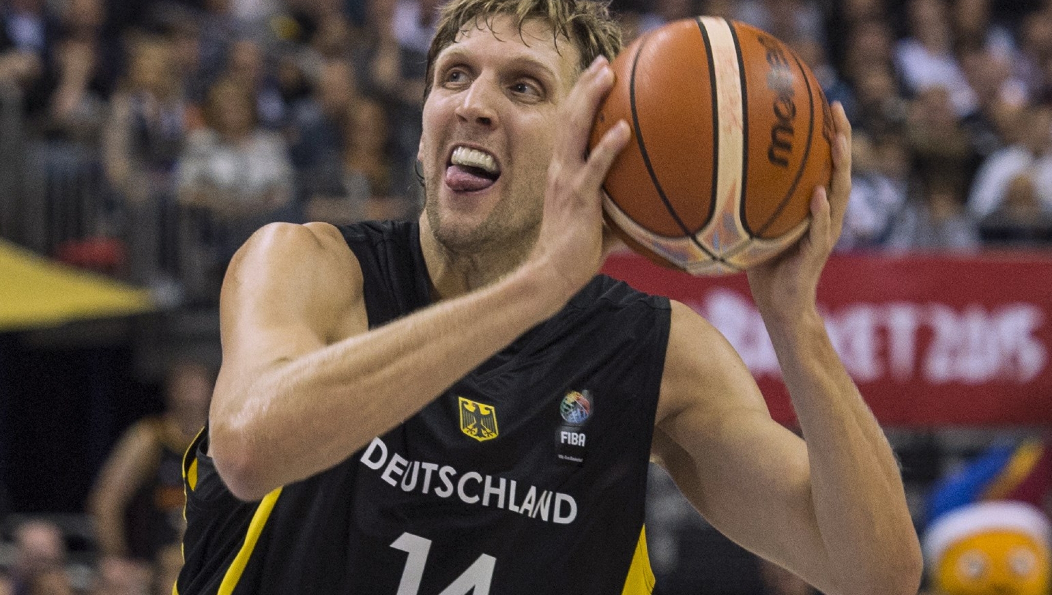 Germany's Dirk Nowitzki makes a pass during the EuroBasket group B match Serbia vs Germany in Berlin September 6, 2015. AFP PHOTO / JOHN MACDOUGALL