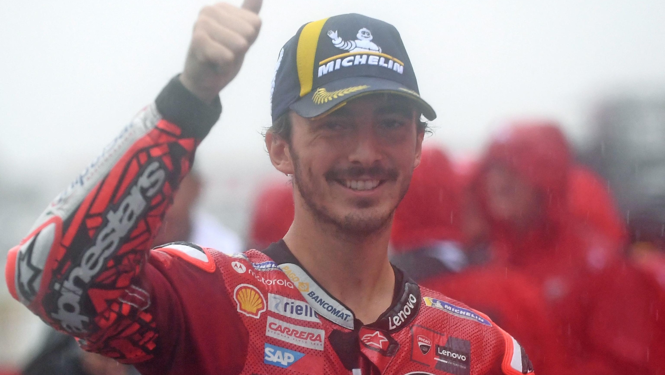 Ducati Lenovo Team rider Francesco Bagnaia of Italy celebrates his second place finish at the parc ferme of the MotoGP Japanese Grand Prix at the Mobility Resort Motegi in Motegi, Tochigi prefecture on October 1, 2023. (Photo by Toshifumi KITAMURA / AFP)