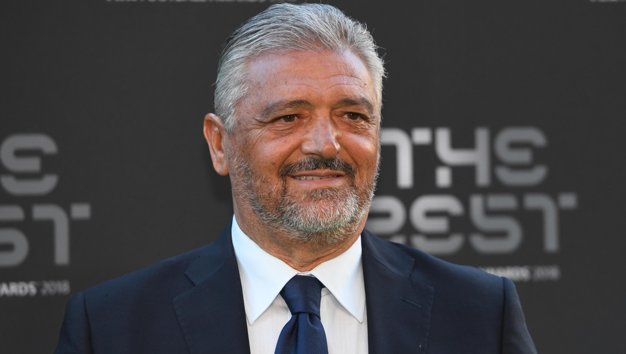 epa07043926 Former Italy player Alessandro Altobelli arrives for the Best FIFA Football Awards 2018 in London, Great Britain, 24 September 2018. Man in center is unidentified.  EPA/FACUNDO ARRIZABALAGA