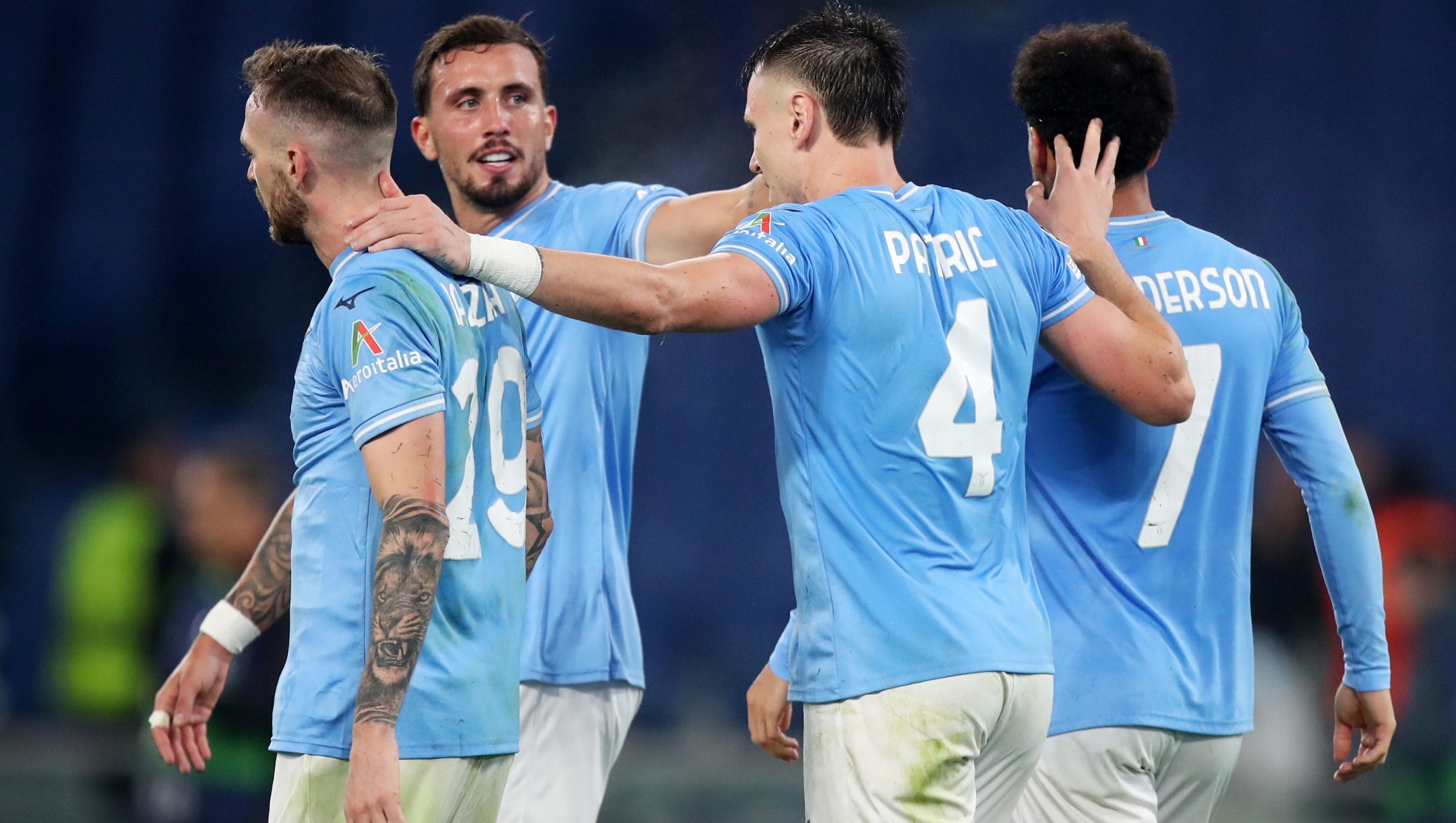 ROME, ITALY - NOVEMBER 07: Manuel Lazzari (L), Luca Pellegrini, Patric and Felipe Anderson of SS Lazio celebrate after the team's victory during the UEFA Champions League match between SS Lazio and Feyenoord at Stadio Olimpico on November 07, 2023 in Rome, Italy. (Photo by Paolo Bruno/Getty Images)