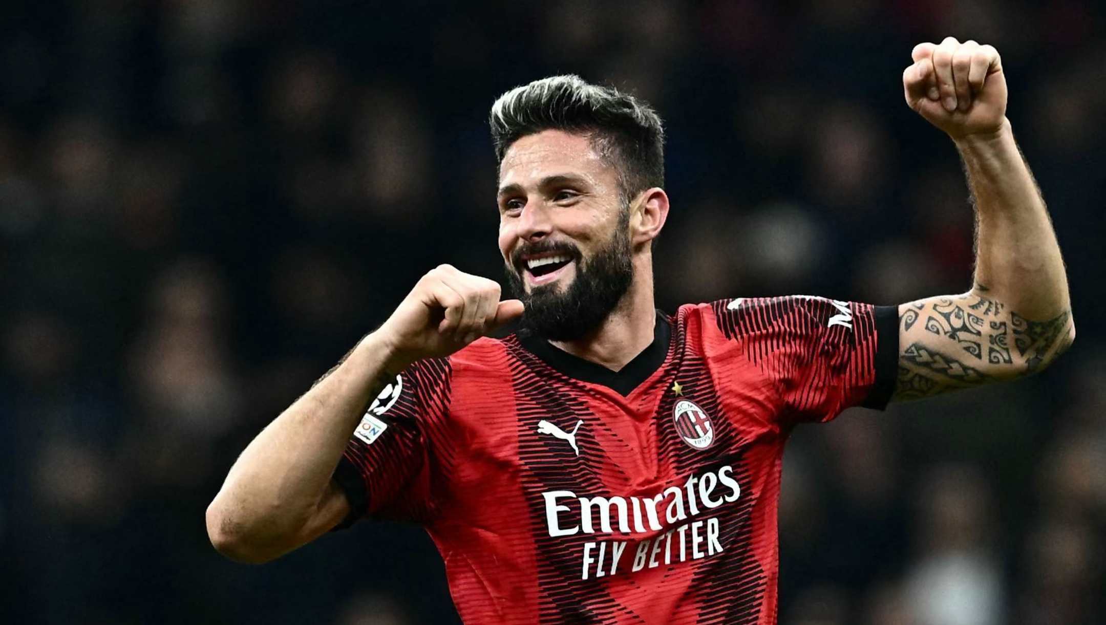 TOPSHOT - AC Milan's French forward #09 Olivier Giroud celebrates after winning 2-1 the UEFA Champions League 1st round group F football match between AC Milan and Paris Saint-Germain at the San Siro stadium in Milan on November 7, 2023. (Photo by GABRIEL BOUYS / AFP)