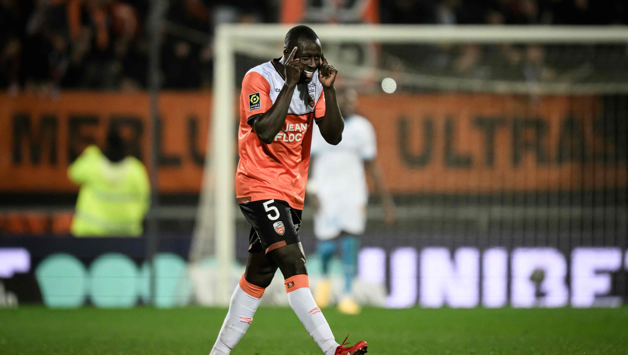 Lorient's French defender #05 Benjamin Mendy celebrates after scoring a goal during the French L1 football match between FC Lorient and Olympique de Marseille at the Moustoir stadium on December 10, 2023 in Lorient, western France. (Photo by LOIC VENANCE / AFP)