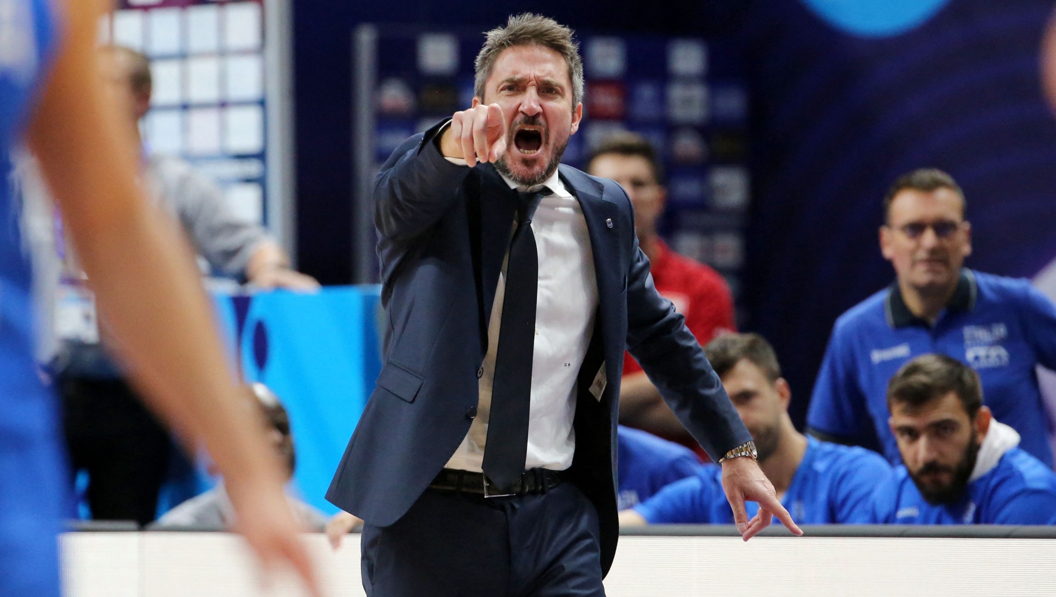 (FILES) Italy's head coach Gianmarco Pozzecco reacts during the FIBA Eurobasket 2022 quarter-final basketball match between France and Italy in Berlin, Germany, on September 14, 2022. Italian coach Gianmarco Pozzecco was appointed LDLC Asvel's coach on October 25, 2023, and will coach his first Euroleague game on October 27, 2023 at the Astroballe arena in Lyon against Italy's Virtus Bologna. (Photo by Oliver Behrendt / AFP)