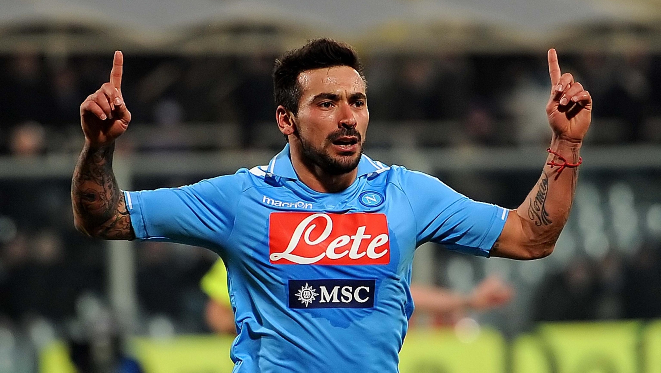 Argentinian forward of Napoli, Ezequiel Lavezzi, jubilates after scoring the goal during the Italian Serie A soccer match ACF Fiorentina vs SSC Napoli at Artemio Franchi stadium in Florence, Italy on 17 February 2012.
ANSA/CARLO FERRARO