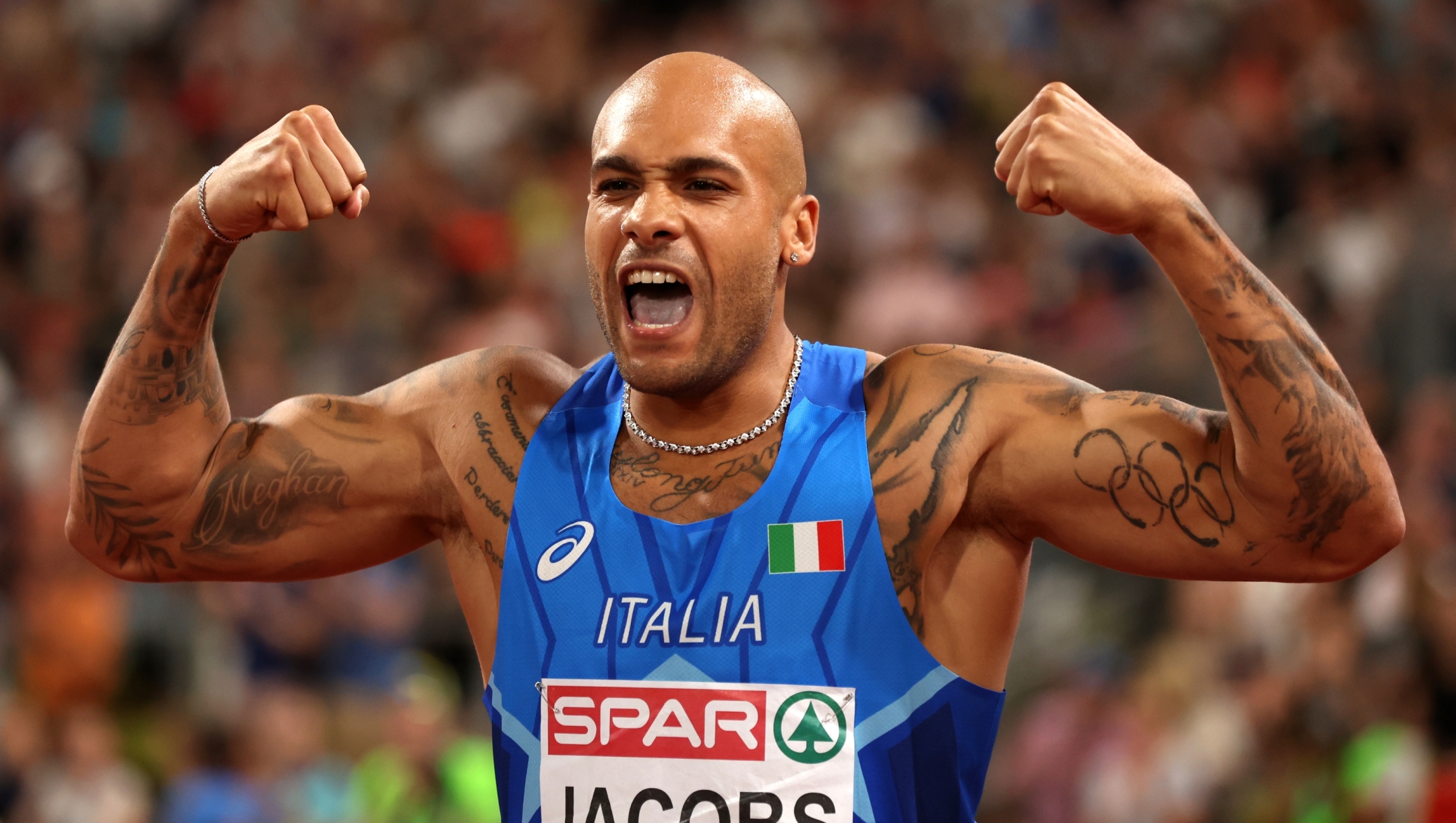 MUNICH, GERMANY - AUGUST 16: Gold medalist Lamont Marcell Jacobs of Italy celebrates after the Athletics - Men's 100m Final on day 6 of the European Championships Munich 2022 at Olympiapark on August 16, 2022 in Munich, Germany. (Photo by Alexander Hassenstein/Getty Images)