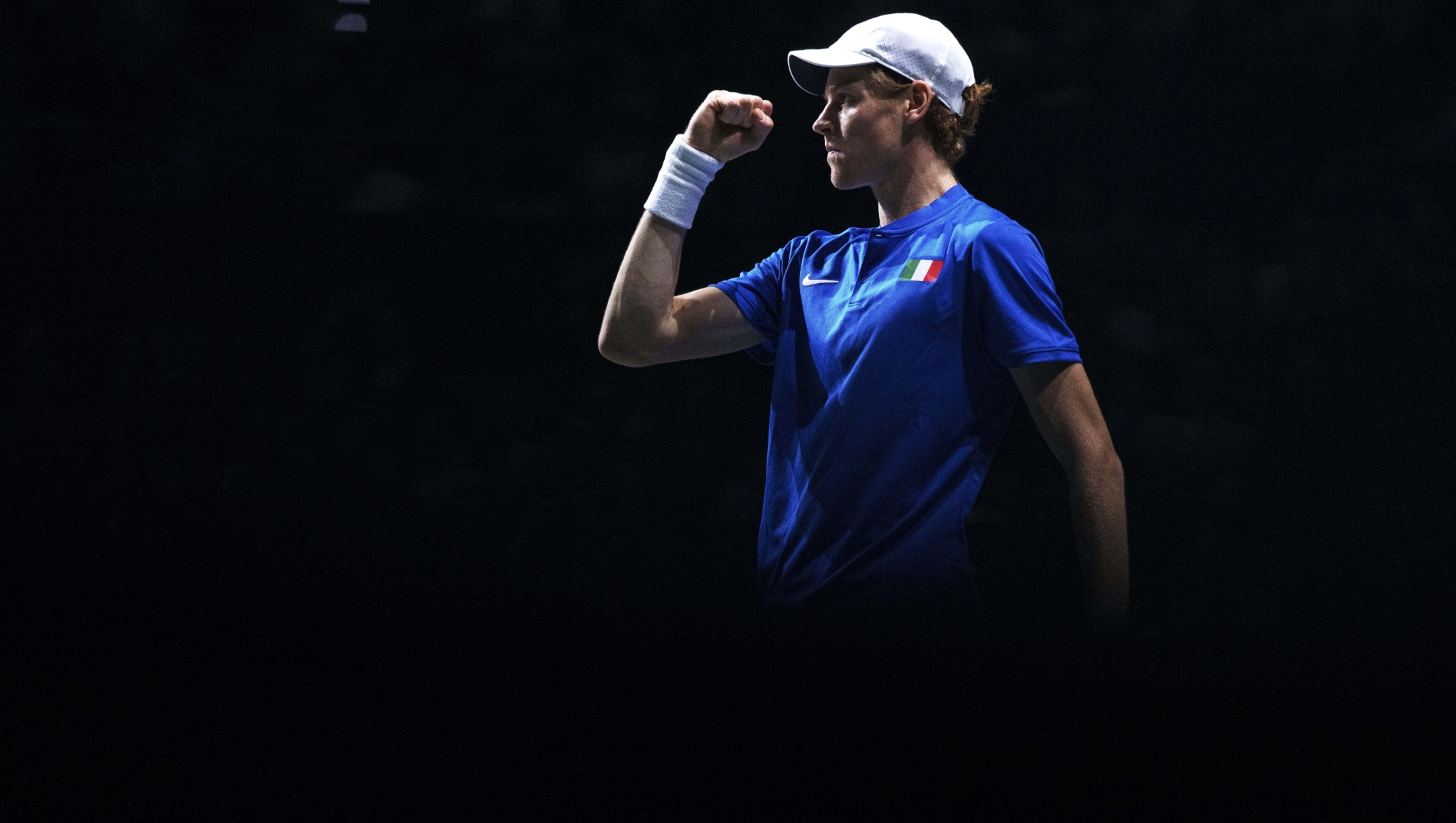 Jannik Sinner of Italy celebrates a point against Novak Djokovic of Serbia during a Davis Cup semi-final tennis match between Italy and Serbia in Malaga, Spain, Saturday, Nov. 25, 2023. (AP Photo/Manu Fernandez)