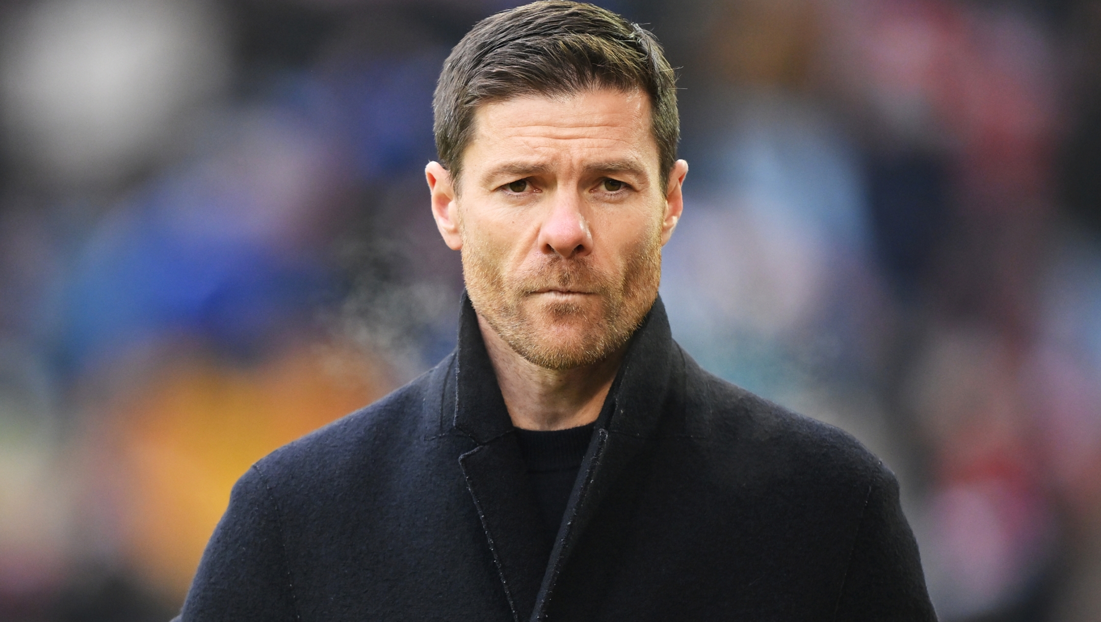 AUGSBURG, GERMANY - JANUARY 13: Xabi Alonso, Head Coach of Bayer Leverkusen, looks on prior to the Bundesliga match between FC Augsburg and Bayer 04 Leverkusen at WWK-Arena on January 13, 2024 in Augsburg, Germany. (Photo by Sebastian Widmann/Getty Images)