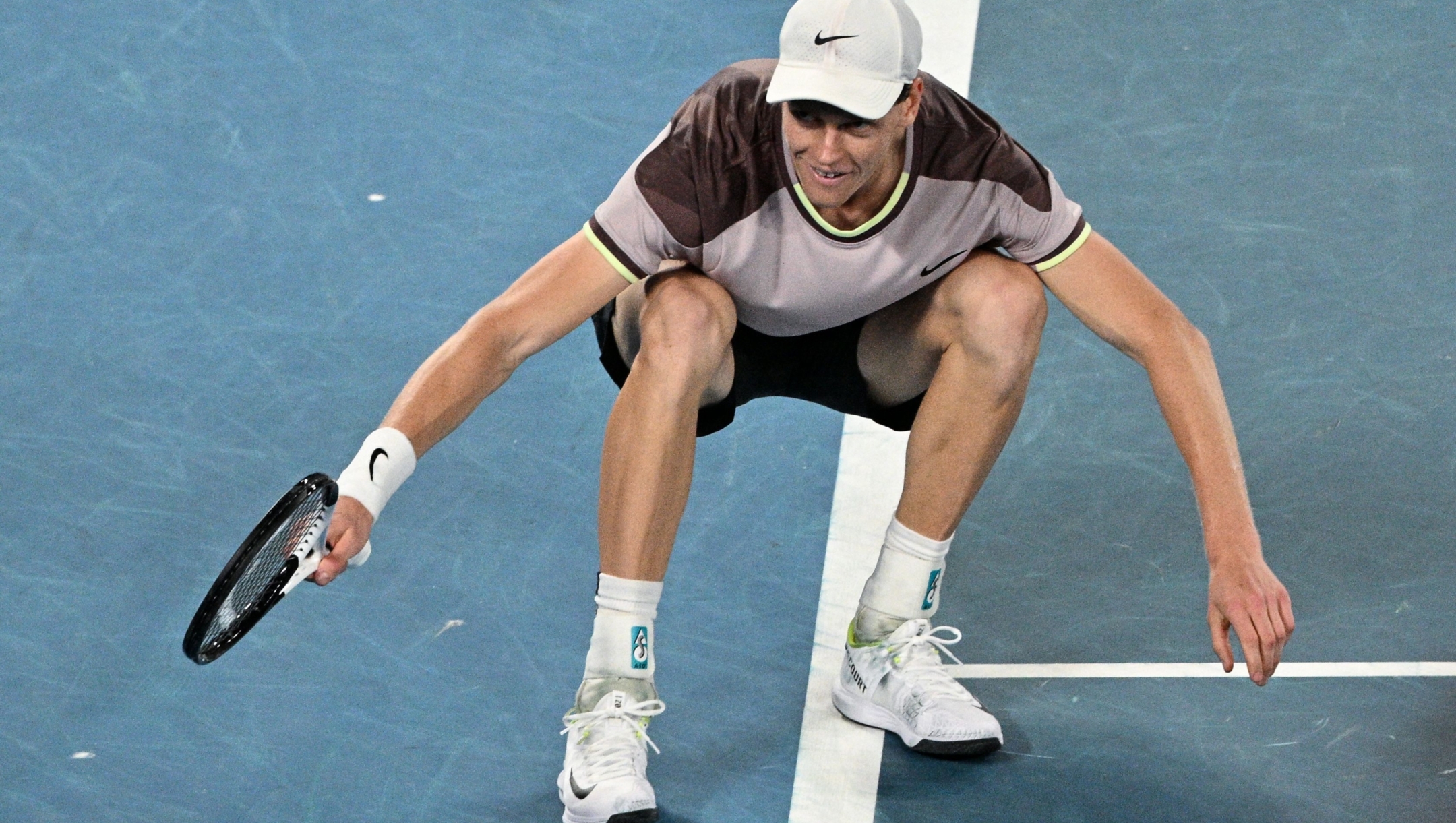 Italy's Jannik Sinner celebrates after victory against Russia's Daniil Medvedev during their men's singles final match on day 15 of the Australian Open tennis tournament in Melbourne on January 28, 2024. (Photo by Anthony WALLACE / AFP) / -- IMAGE RESTRICTED TO EDITORIAL USE - STRICTLY NO COMMERCIAL USE --