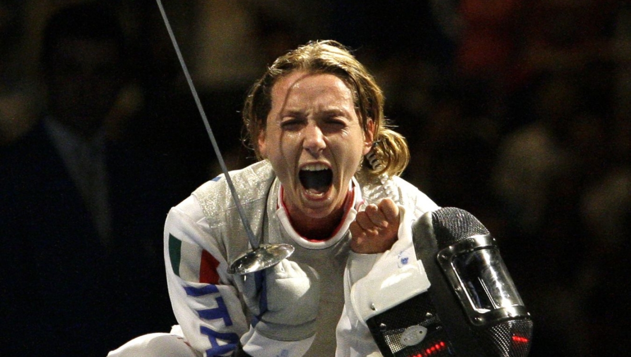 Italy's Valentina Vezzali reacts after defeating Korea's Nam Hyunhee  in the gold medal competition in the women's individual foil fencing event Monday, Aug. 11, 2008, at the 2008 Olympics in Beijing. Vezzali won the gold. (AP Photo/Elaine Thompson)