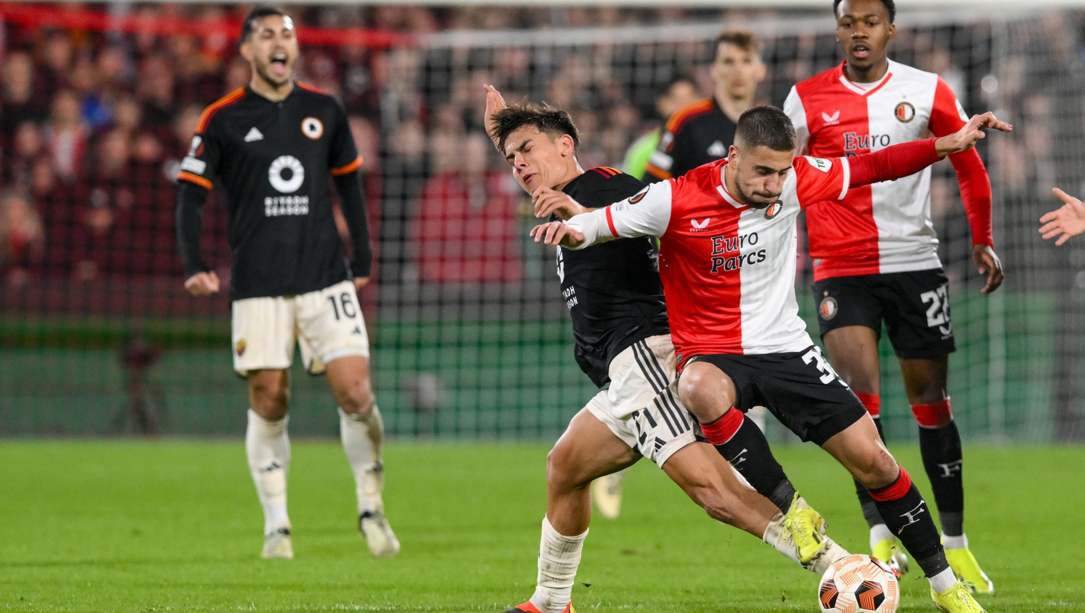 ROTTERDAM, NETHERLANDS - FEBRUARY 15: Paulo Dybala of AS Roma  competes for the ball during the UEFA Europa League 2023/24 Playoff First Leg match between Feyenoord and AS Roma at Feyenoord Stadium on February 15, 2024 in Rotterdam, Netherlands. (Photo by Fabio Rossi/AS Roma via Getty Images)