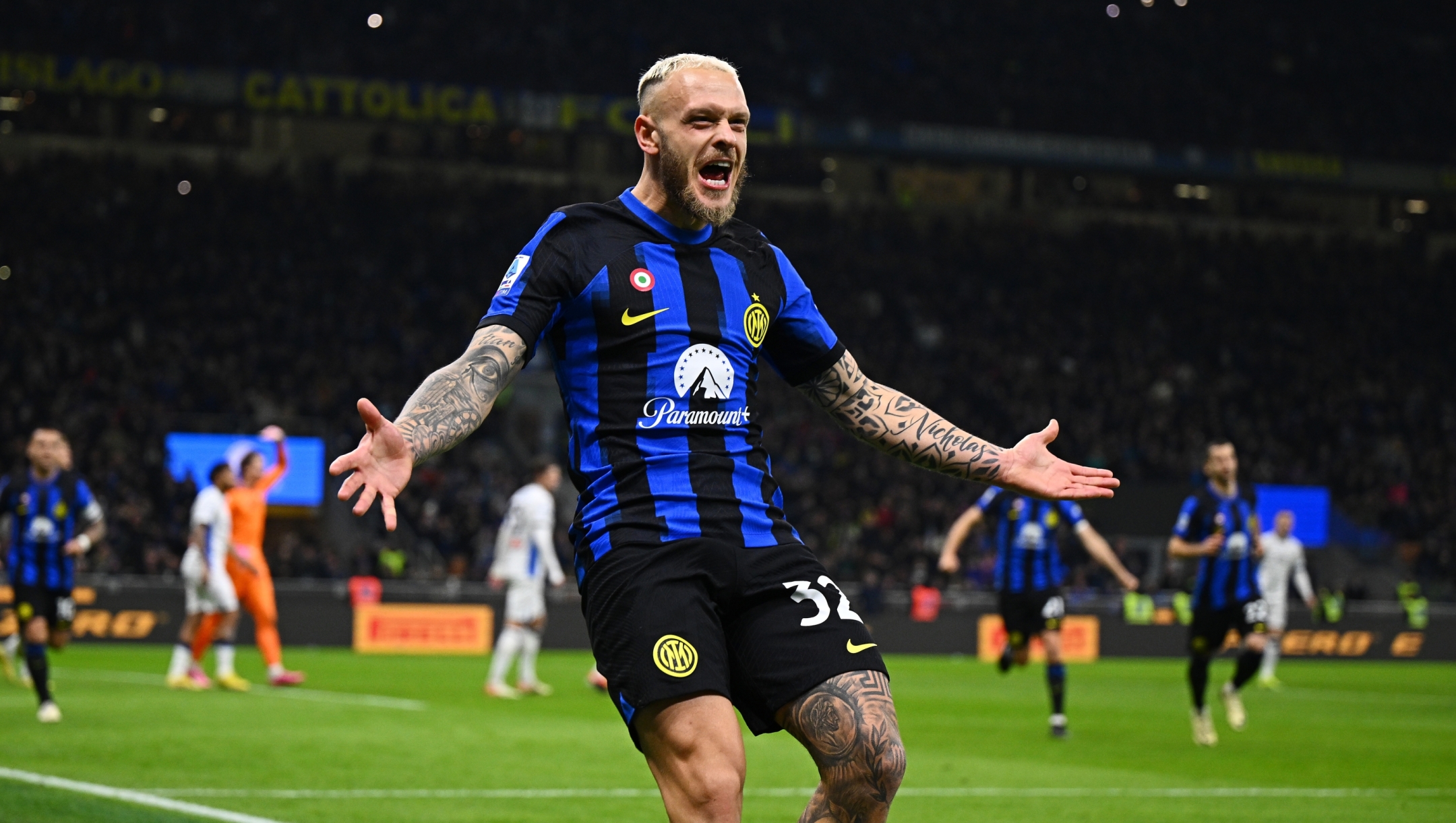MILAN, ITALY - FEBRUARY 28: Federico Dimarco of FC Internazionale celebrates after scoring their team's third goal during the Serie A TIM match between FC Internazionale and Atalanta BC - Serie A TIM  at Stadio Giuseppe Meazza on February 28, 2024 in Milan, Italy. (Photo by Mattia Ozbot - Inter/Inter via Getty Images)