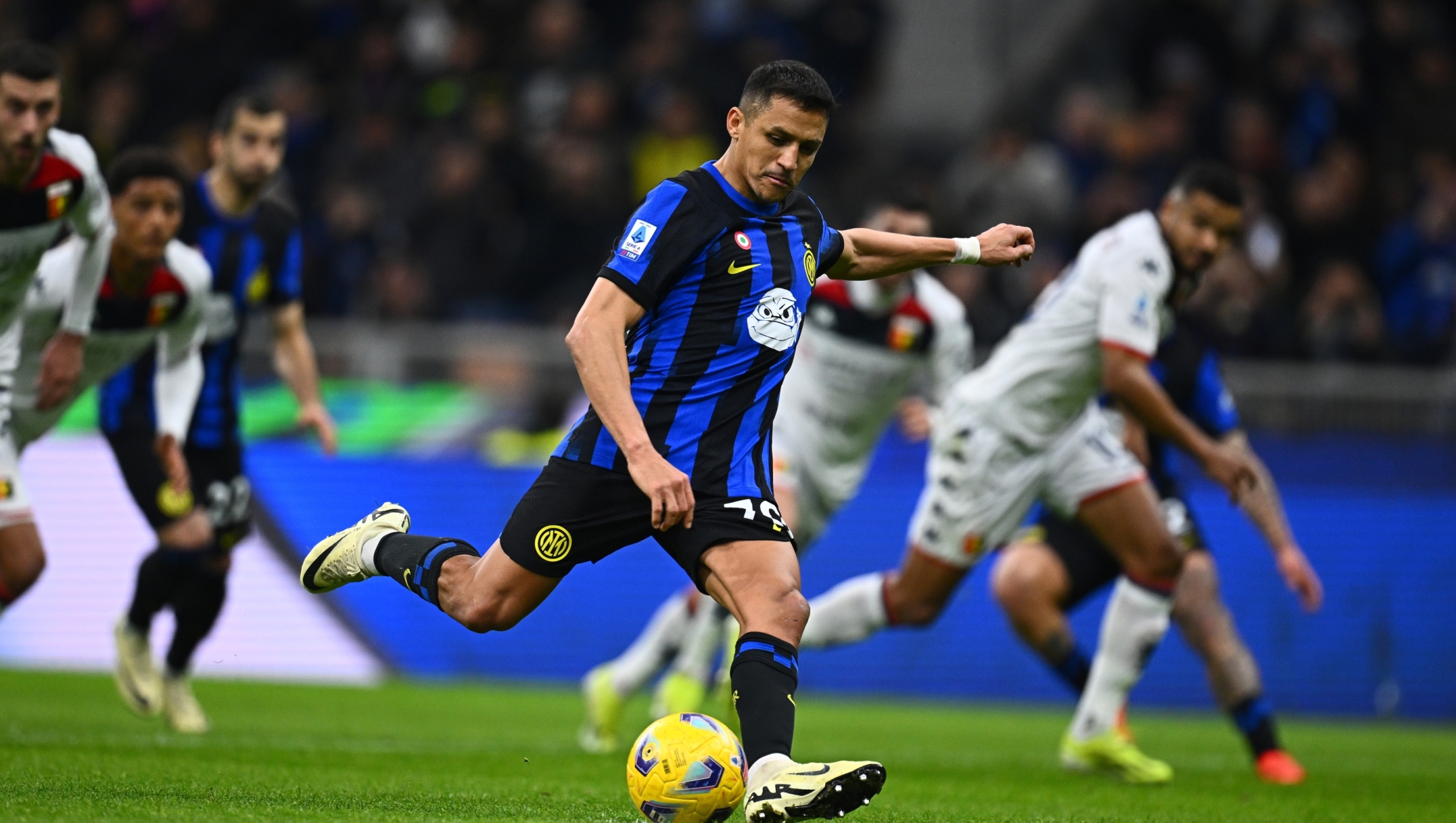 MILAN, ITALY - MARCH 04: Alexis Sanchez of FC Internazionale scores his team's second goal by penalty during the Serie A TIM match between FC Internazionale and Genoa CFC - Serie A TIM  at Stadio Giuseppe Meazza on March 04, 2024 in Milan, Italy. (Photo by Mattia Ozbot - Inter/Inter via Getty Images)