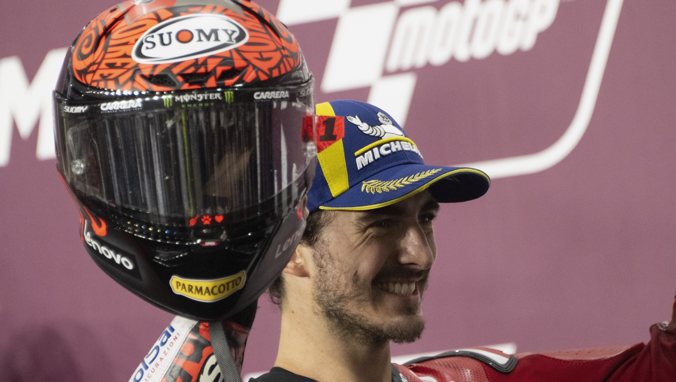 DOHA, QATAR - MARCH 10: Francesco Bagnaia of Italy and Ducati Lenovo Team celebrates the victory  under the podium at the end of the MotoGP race  during the MotoGP Of Qatar - Race at Losail Circuit on March 10, 2024 in Doha, Qatar. (Photo by Mirco Lazzari gp/Getty Images)