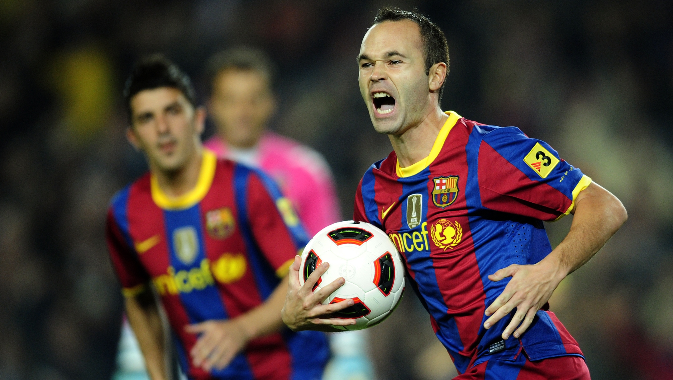 FC Barcelona's Andres Iniesta reacts after scoring against Valencia during a Spanish La Liga soccer match at the Camp Nou stadium in Barcelona, Spain, Saturday, Oct. 16, 2010. (AP Photo/Manu Fernandez)