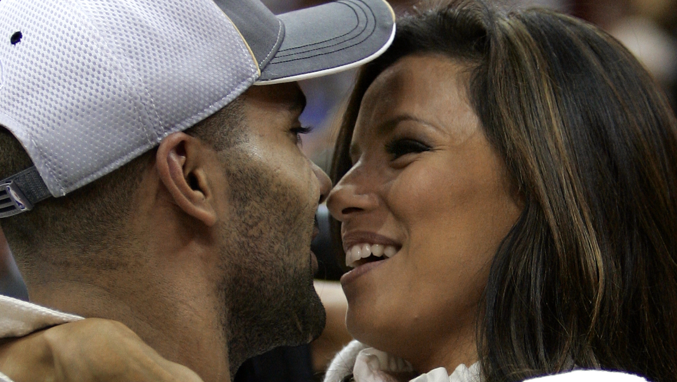 Tony Parker of the San Antonio Spurs and MVP hugs his fiance actress Eva Longoria after leading the Spurs to their fourth NBA title beating the Cleveland Cavaliers in Game Four of the NBA Finals 14 June 2007 at Quicken Loans Arena in Cleveland, Ohio. The Spurs won the game 83-82 to sweep the best-of-seven series 4-0.    AFP PHOTO  /   TIMOTHY A. CLARY