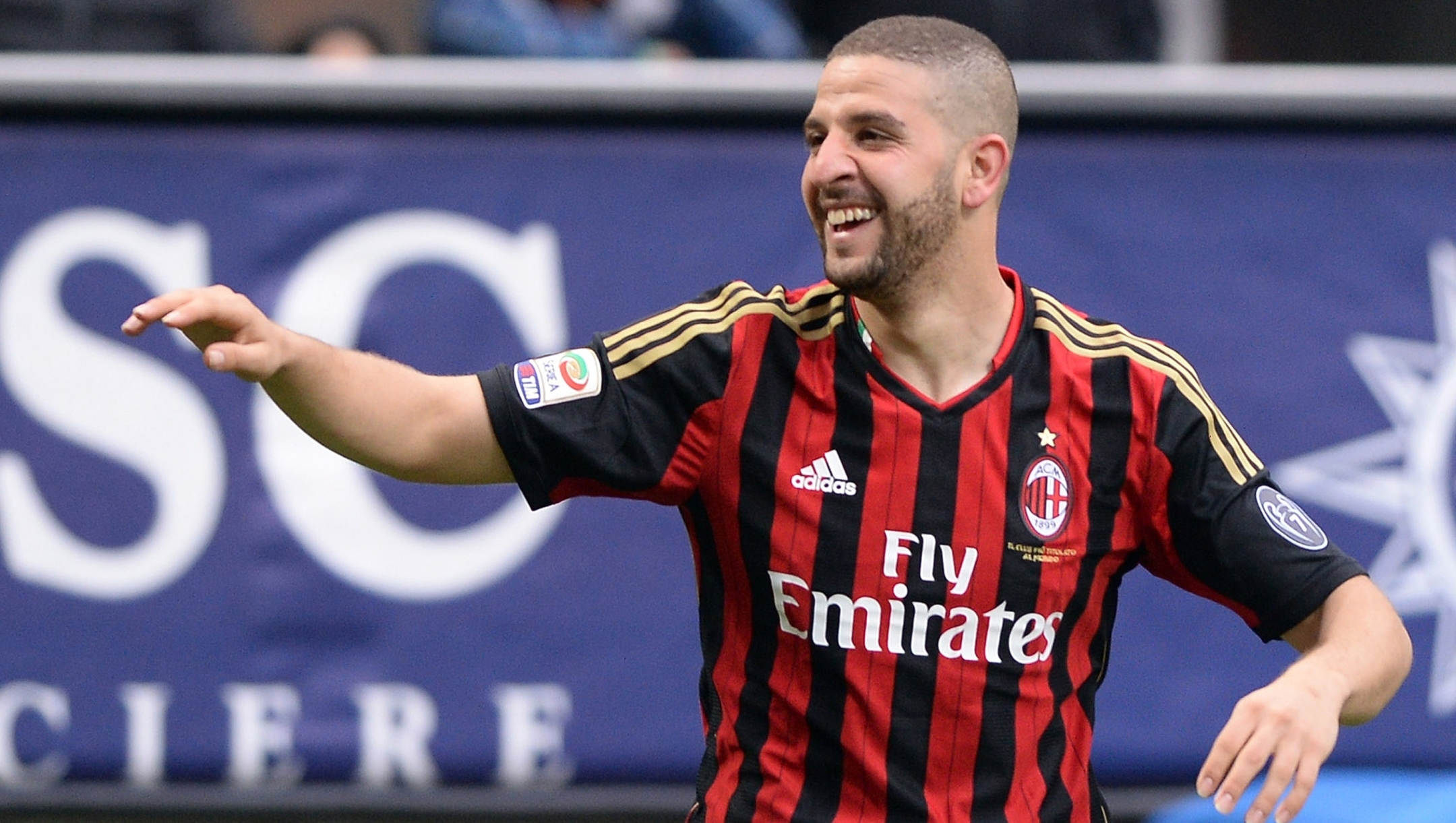 MILAN, ITALY - APRIL 19:  Adel Taarabt of AC Milan (R) celebrates scoring the second goal during the Serie A match between AC Milan and AS Livorno Calcio at San Siro Stadium on April 19, 2014 in Milan, Italy.  (Photo by Claudio Villa/Getty Images)