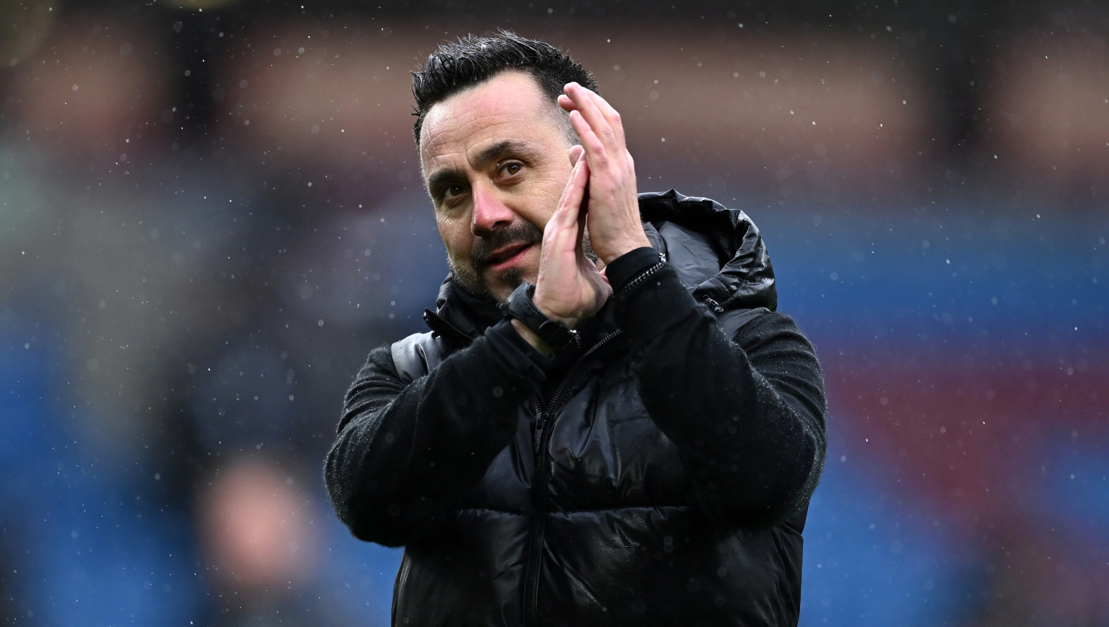 BURNLEY, ENGLAND - APRIL 13: Roberto De Zerbi, Manager of Brighton & Hove Albion, applauds the fans after the draw in the Premier League match between Burnley FC and Brighton & Hove Albion at Turf Moor on April 13, 2024 in Burnley, England. (Photo by Gareth Copley/Getty Images) (Photo by Gareth Copley/Getty Images)