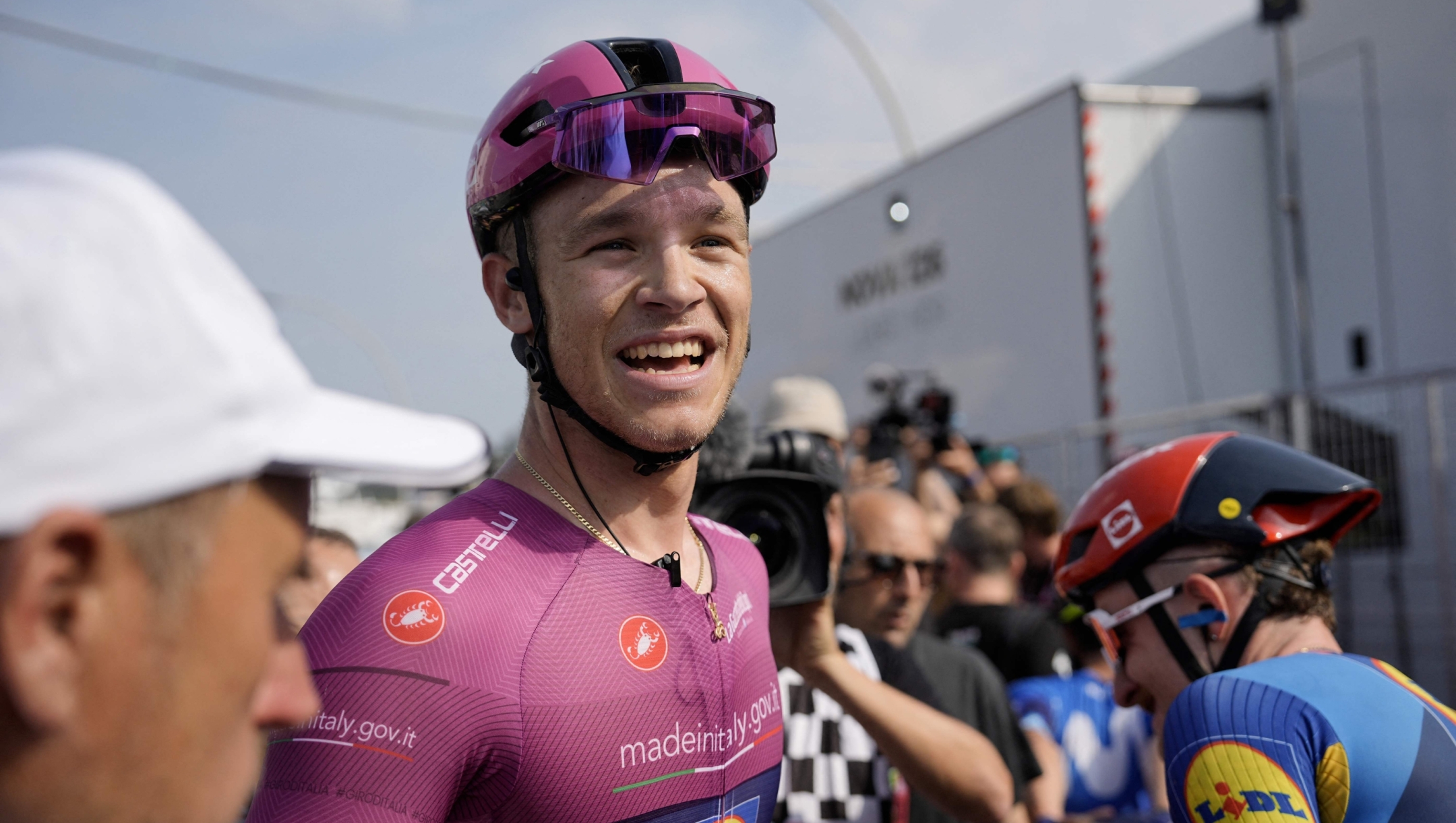 Team Lidl-Trek's Italian rider Jonathan Milan after winning the 11th stage of the 107th Giro d'Italia cycling race, 207km between Foiano di Val Fortore and Franca Villa al Mare, on May 15, 2024. (Photo by Marco Alpozzi / POOL / AFP)