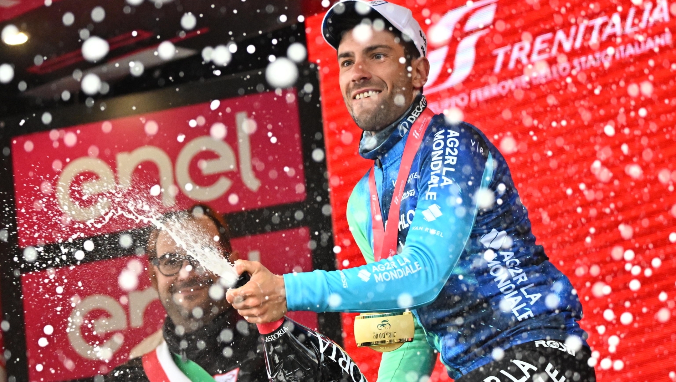 Italian rider Andrea Vendrame of Decathlon Ag2r La Mondiale Team celebrates on the podium after winning the 19th stage of the 107 Giro d'Italia 2024, cycling race over 157 km from Mortegliano to Sappada, Italy, 24 May 2024. ANSA/LUCA ZENNARO